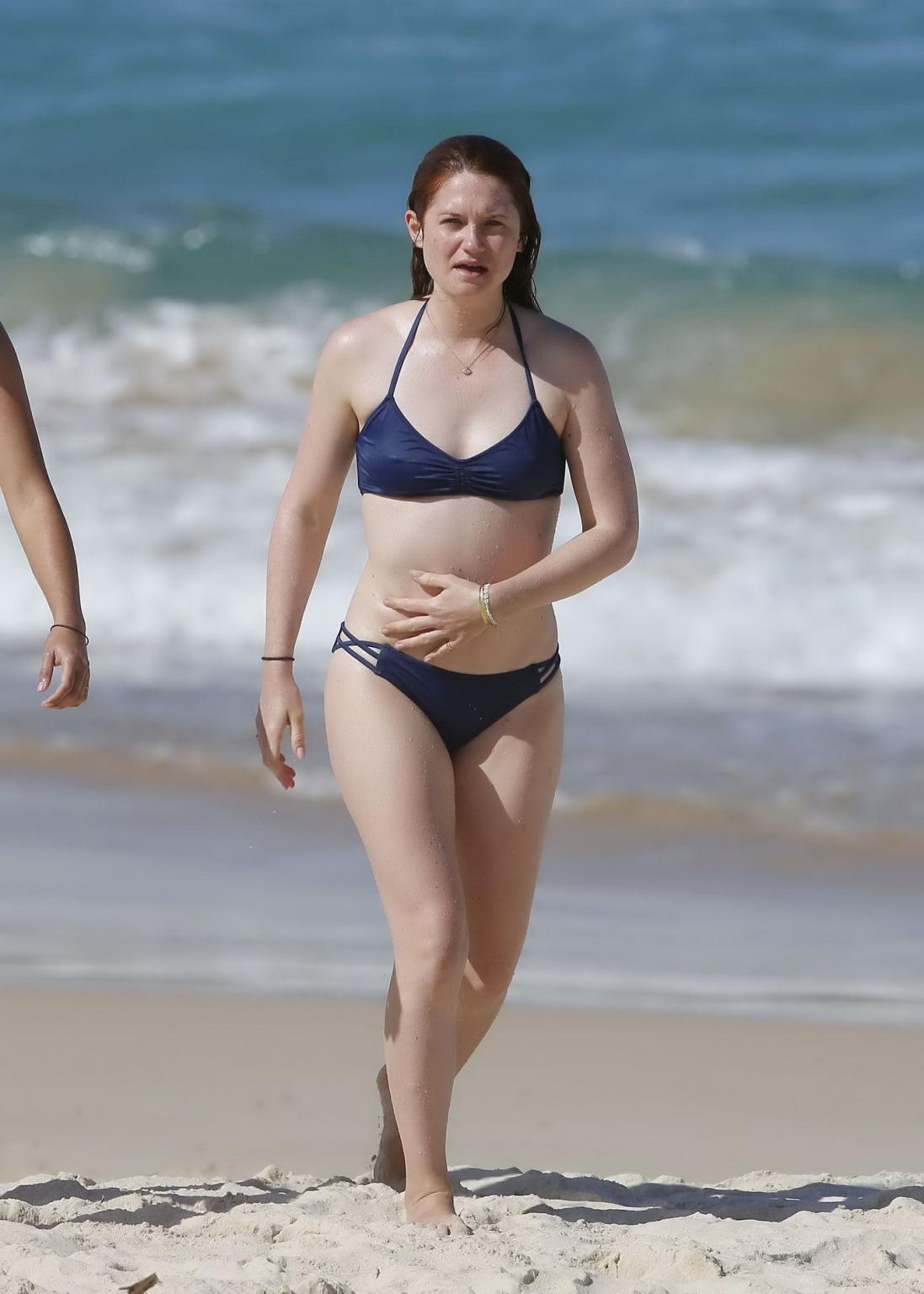 16P Bonnie Wright shows nipple pokies and ass in a blue bikini