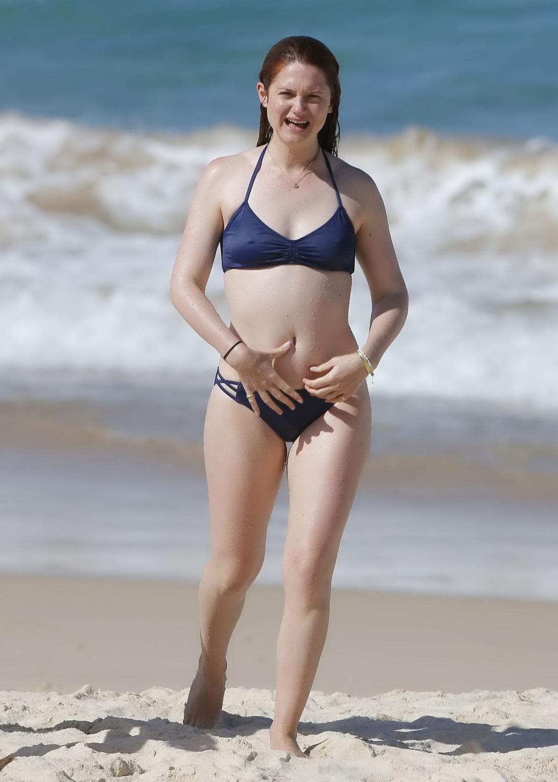 16P Bonnie Wright shows nipple pokies and ass in a blue bikini