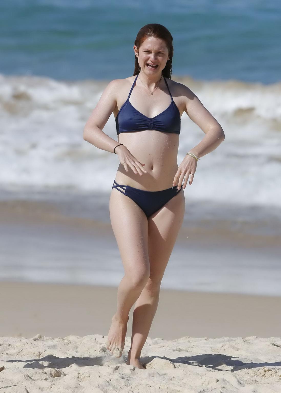 16P Bonnie Wright shows nipple pokies and ass in a blue bikini