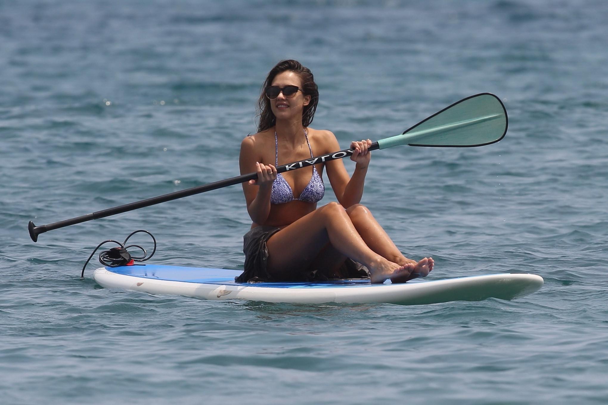 16P Jessica Alba wearing tiny blue string bikini in Hawaii