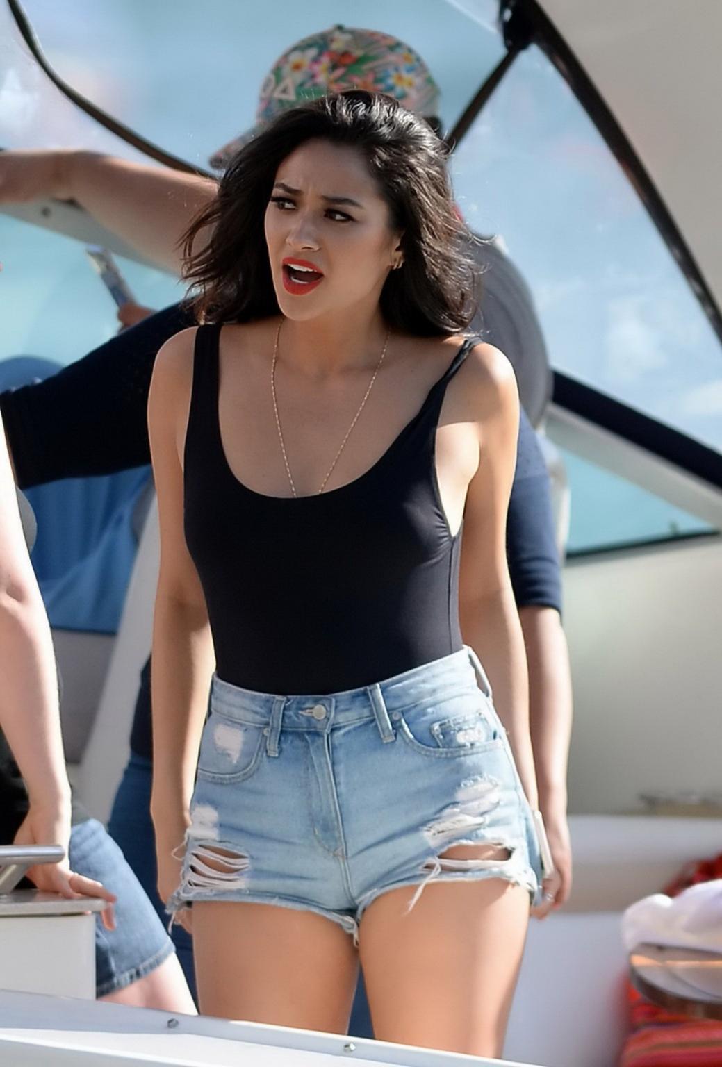 16P Shay Mitchell busty in black swimsuit and denim shorts