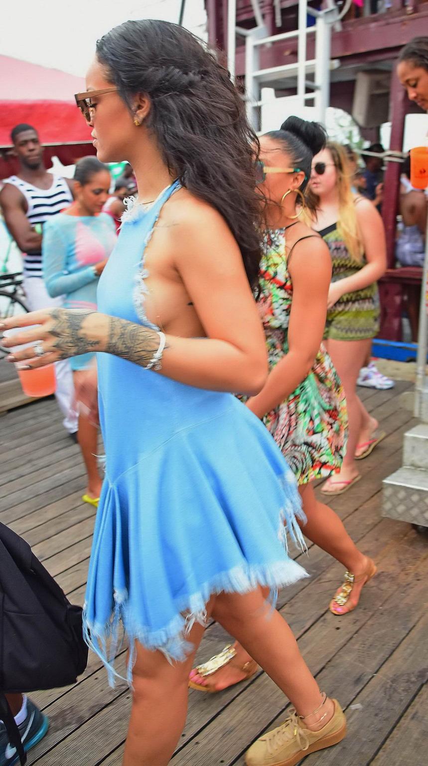 16P Rihanna showing sideboob and pokies in tiny blue dress