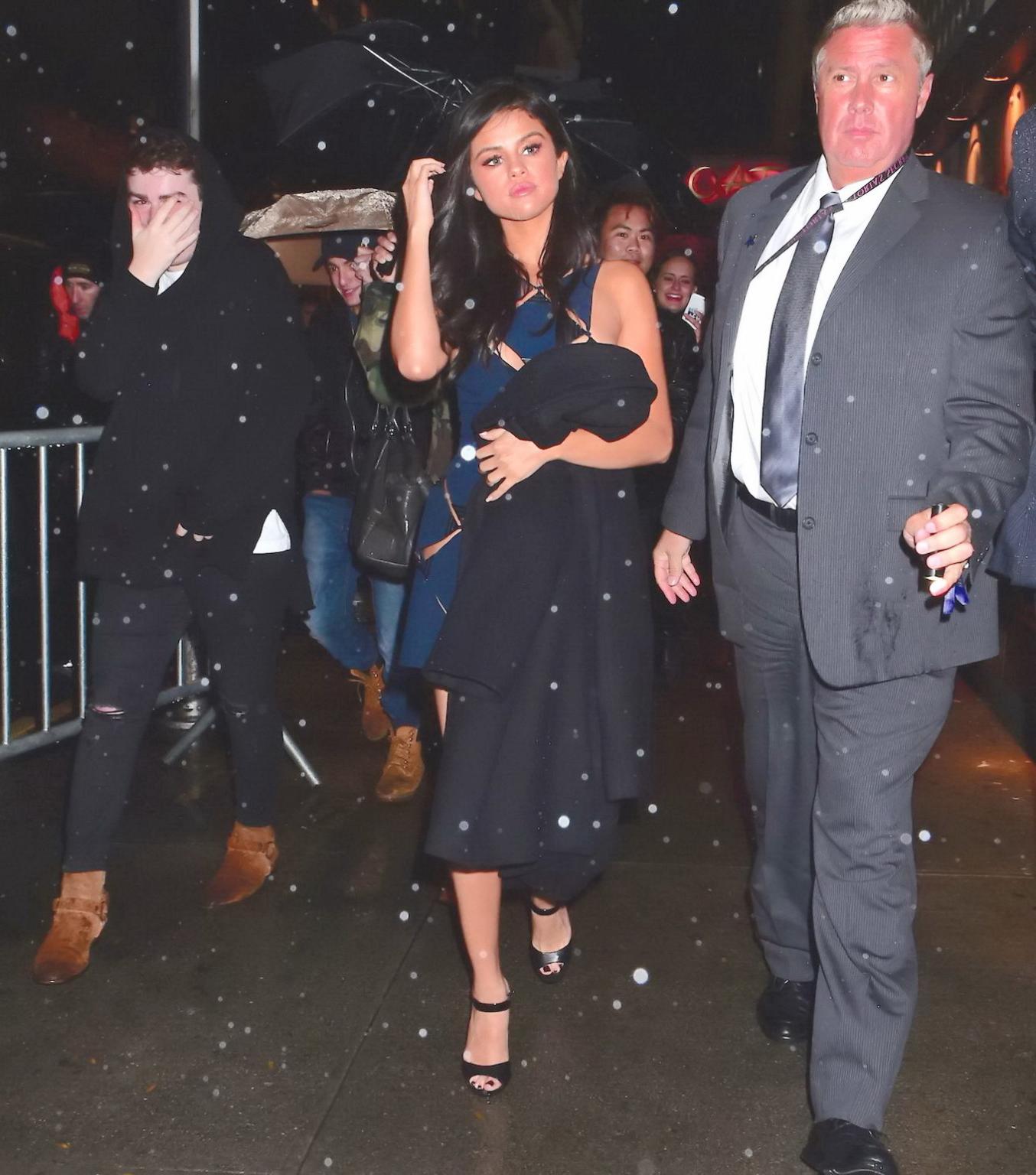 16P Selena Gomez braless and pantyless in a blue mini dress