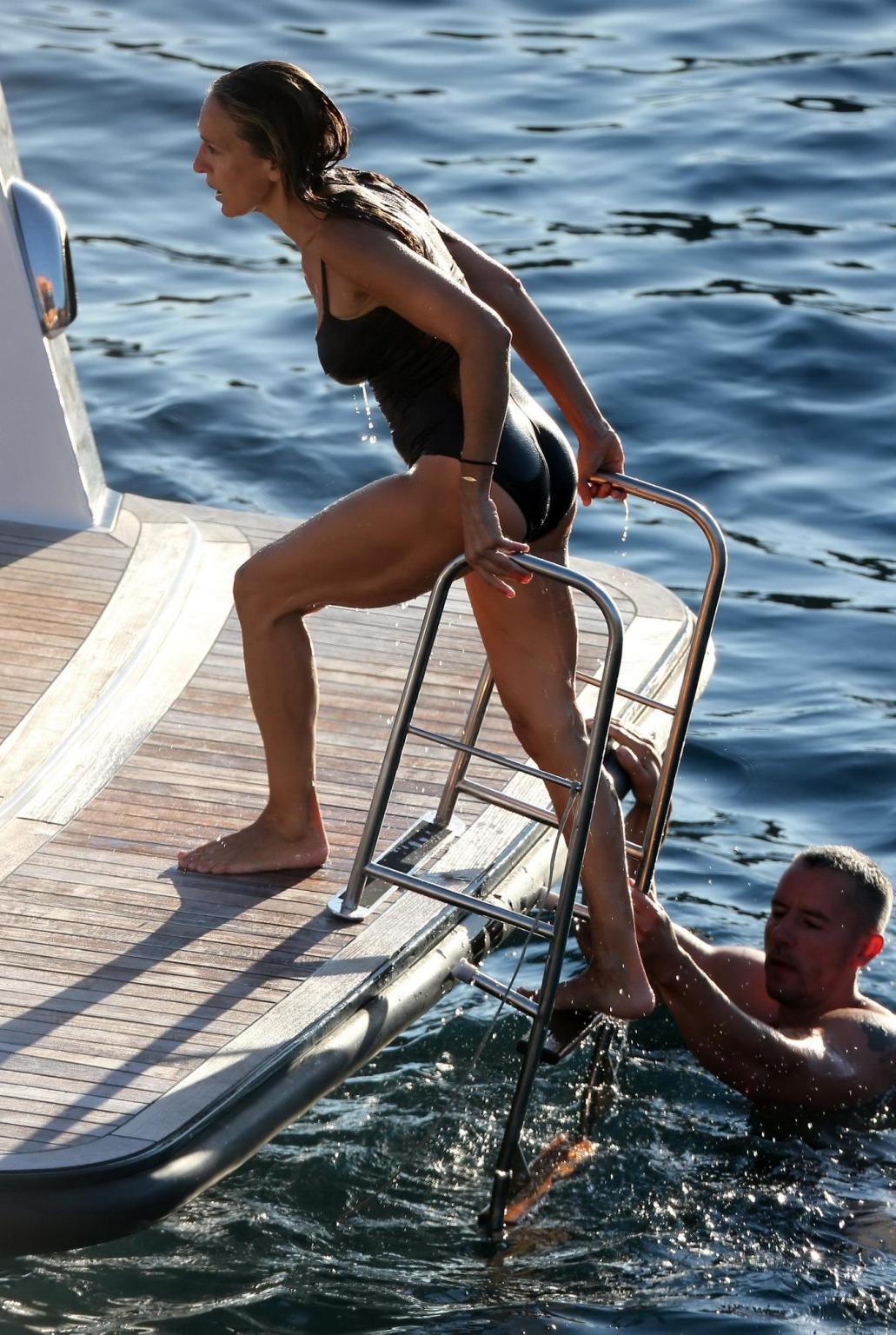 16P Sarah Jessica Parker wearing brown swimsuit