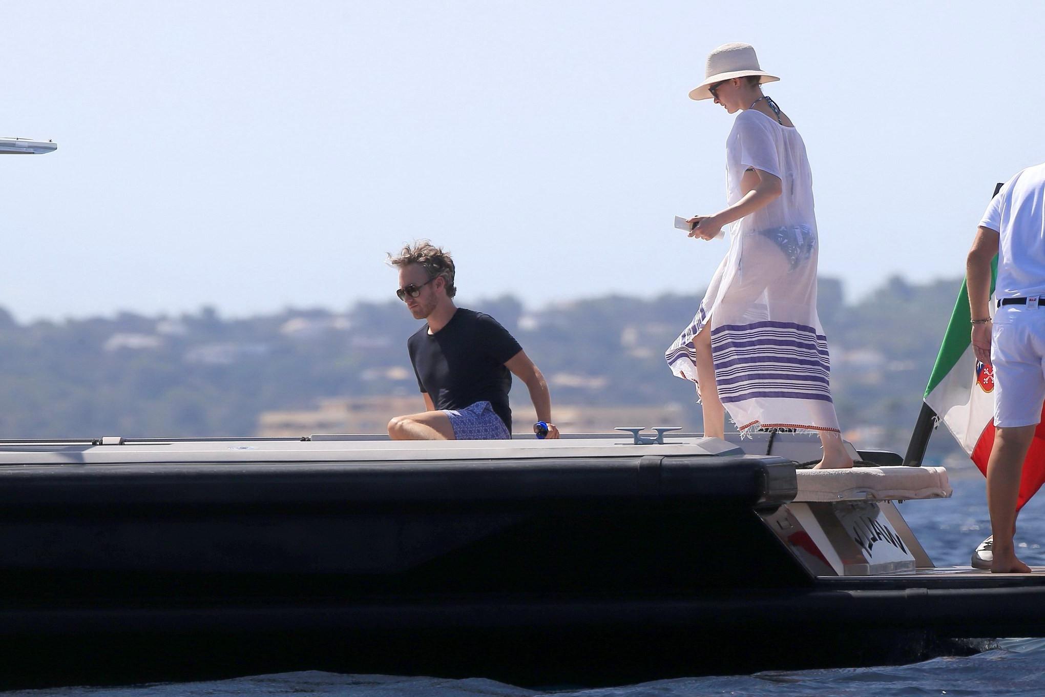 16P Anne Hathaway wearing bikini on a boat in Ibiza Spain