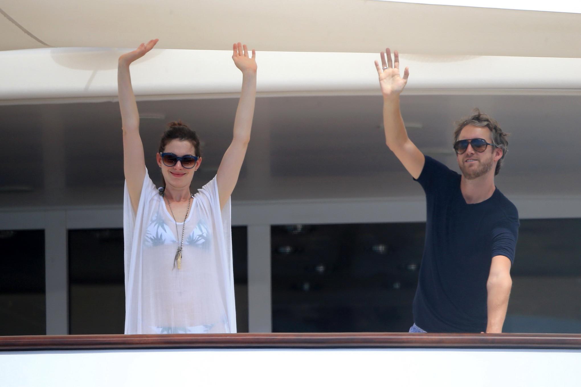 16P Anne Hathaway wearing bikini on a boat in Ibiza Spain