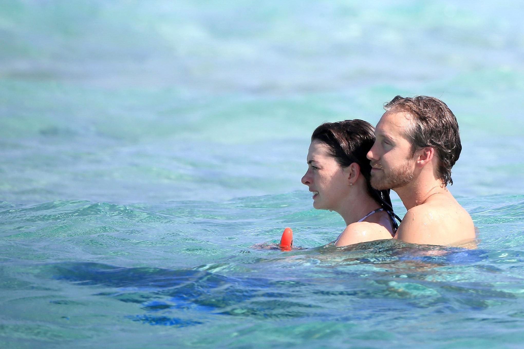 16P Anne Hathaway wearing bikini on a boat in Ibiza Spain