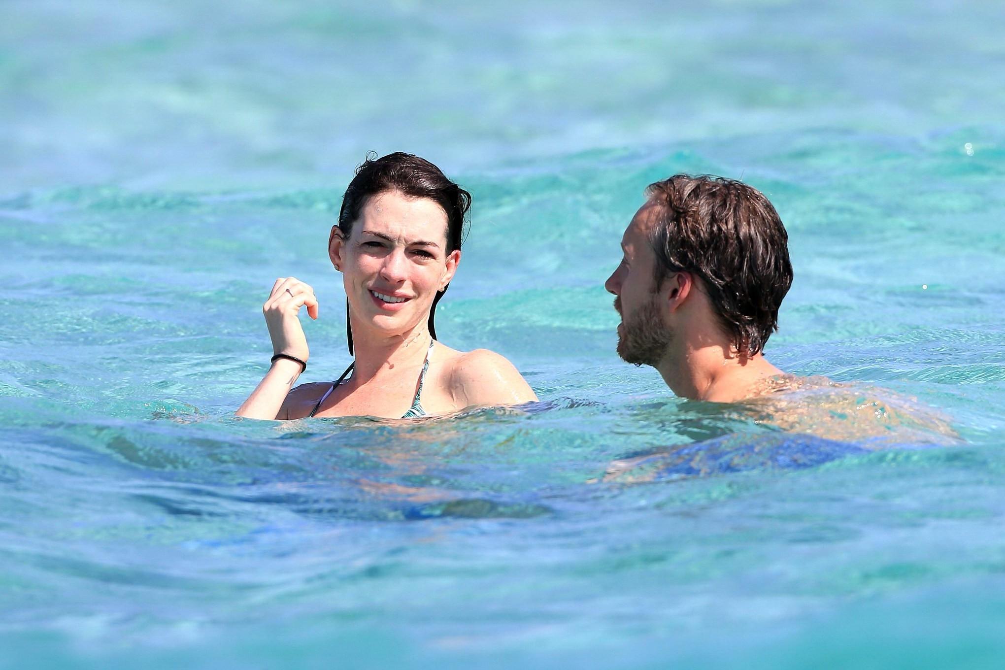 16P Anne Hathaway wearing bikini on a boat in Ibiza Spain