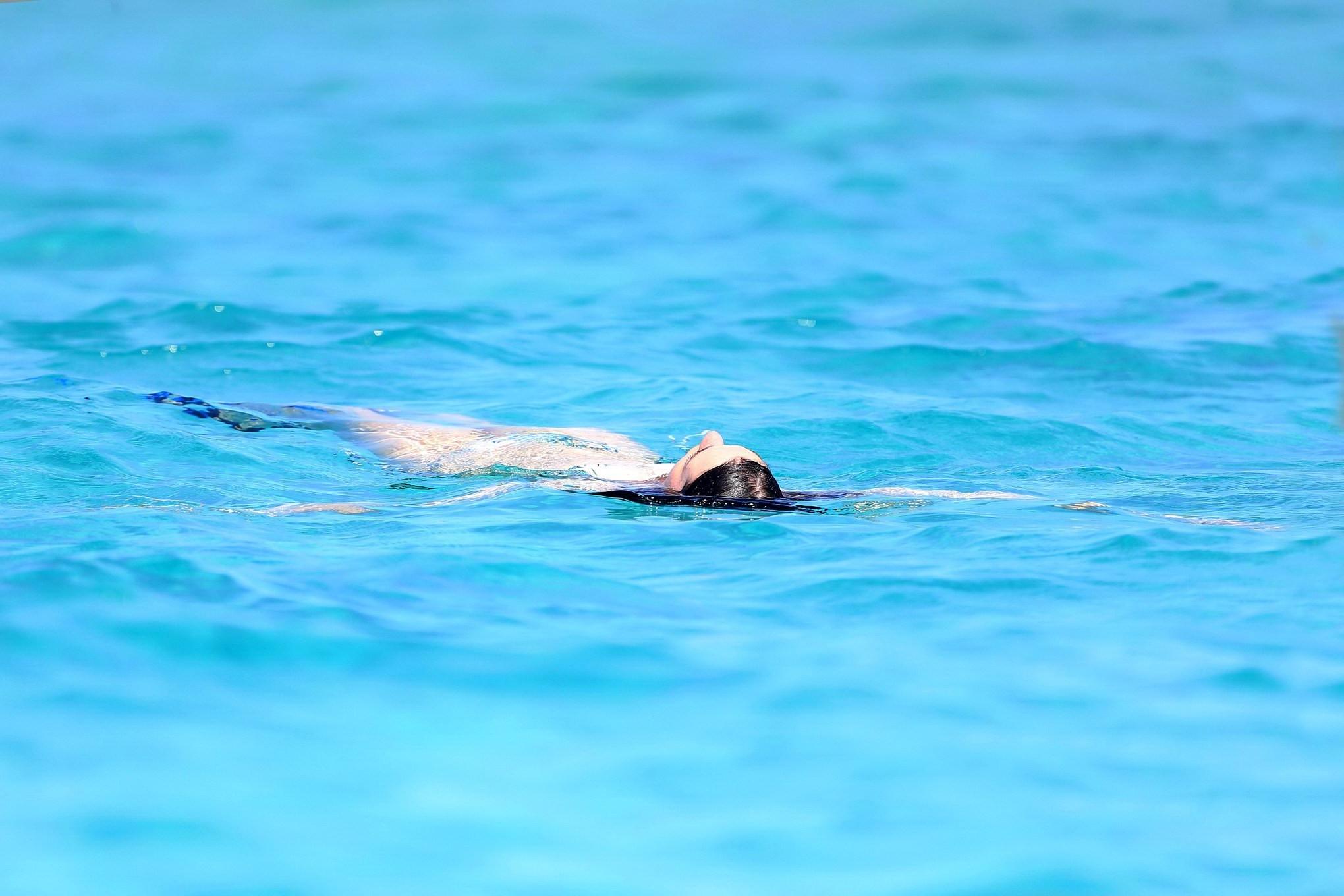 16P Anne Hathaway wearing bikini on a boat in Ibiza Spain