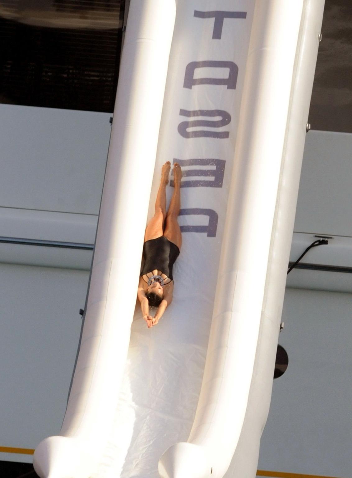 16P Nina Dobrev wearing a sexy black swimsuit on a yacht in St Tropez