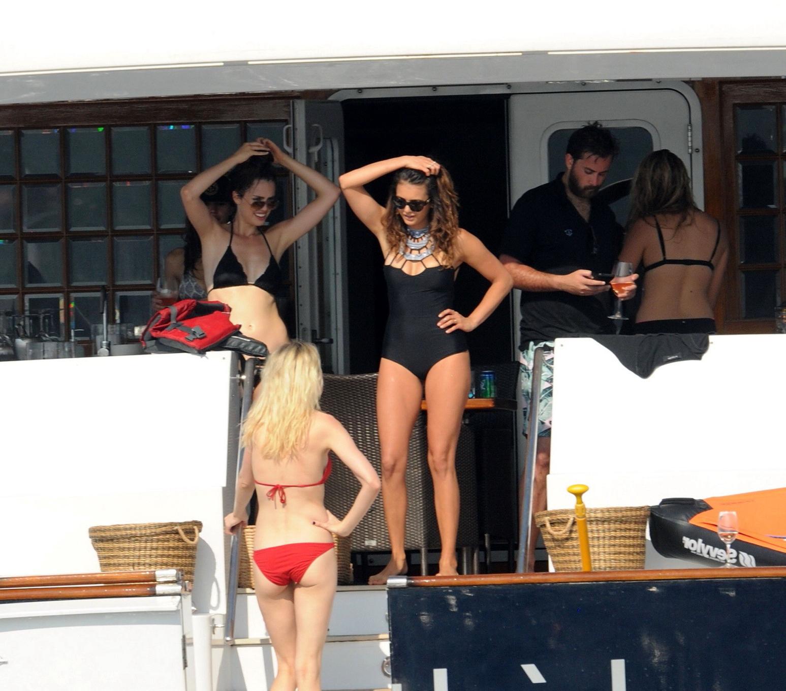 16P Nina Dobrev wearing a sexy black swimsuit on a yacht in St Tropez