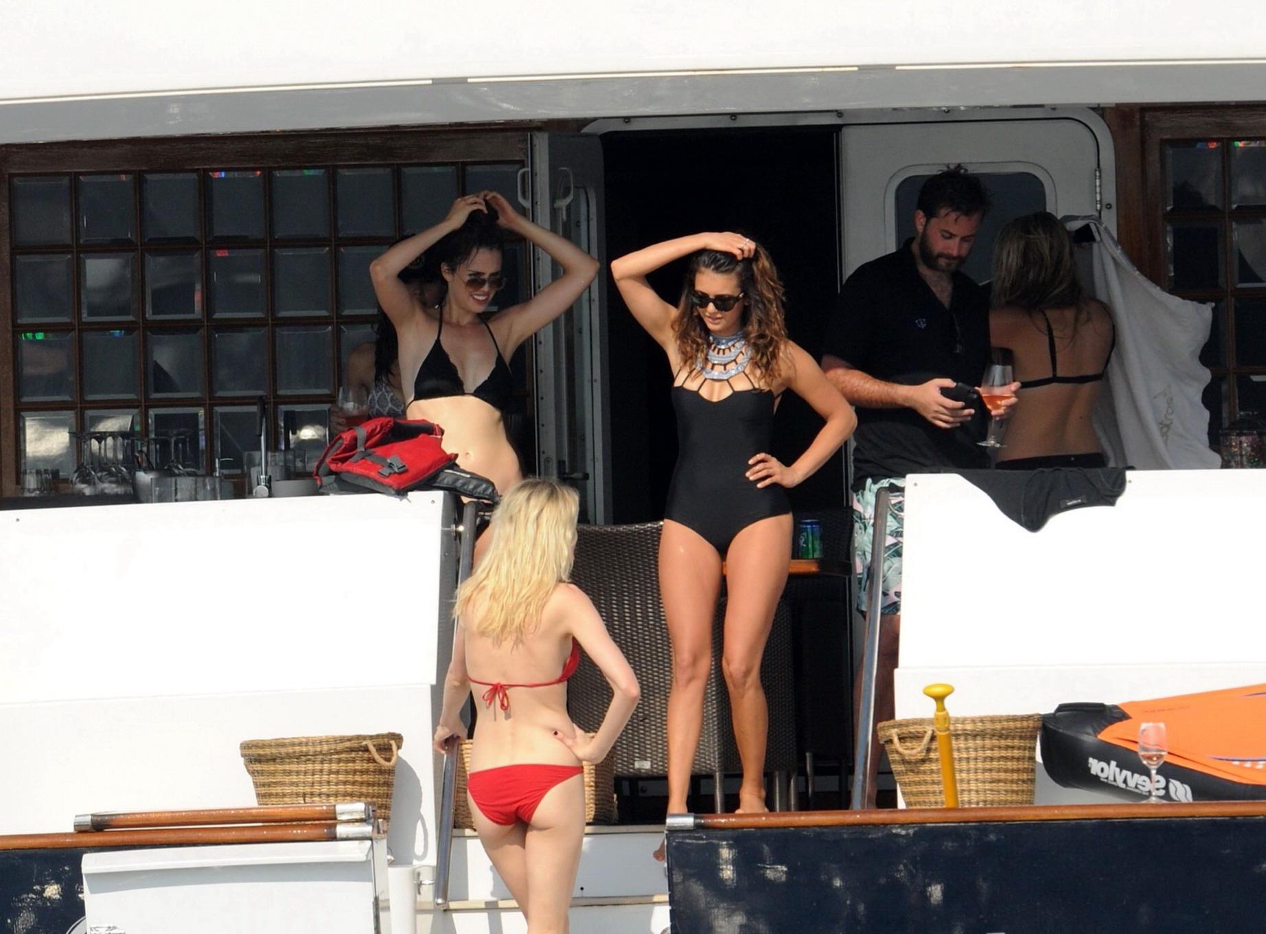 16P Nina Dobrev wearing a sexy black swimsuit on a yacht in St Tropez