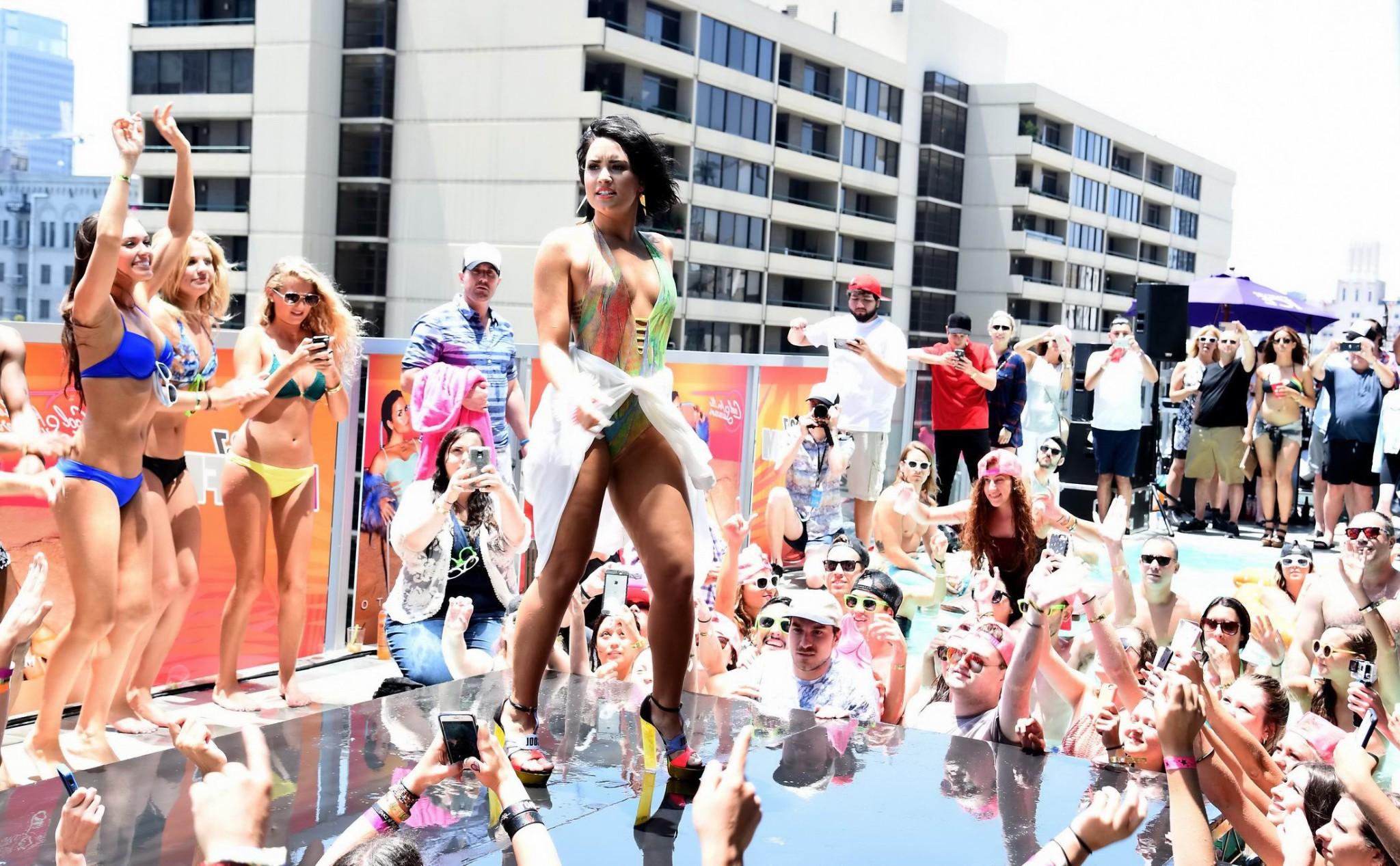 16P Demi Lovato getting wet in low cut swimsuit poolside