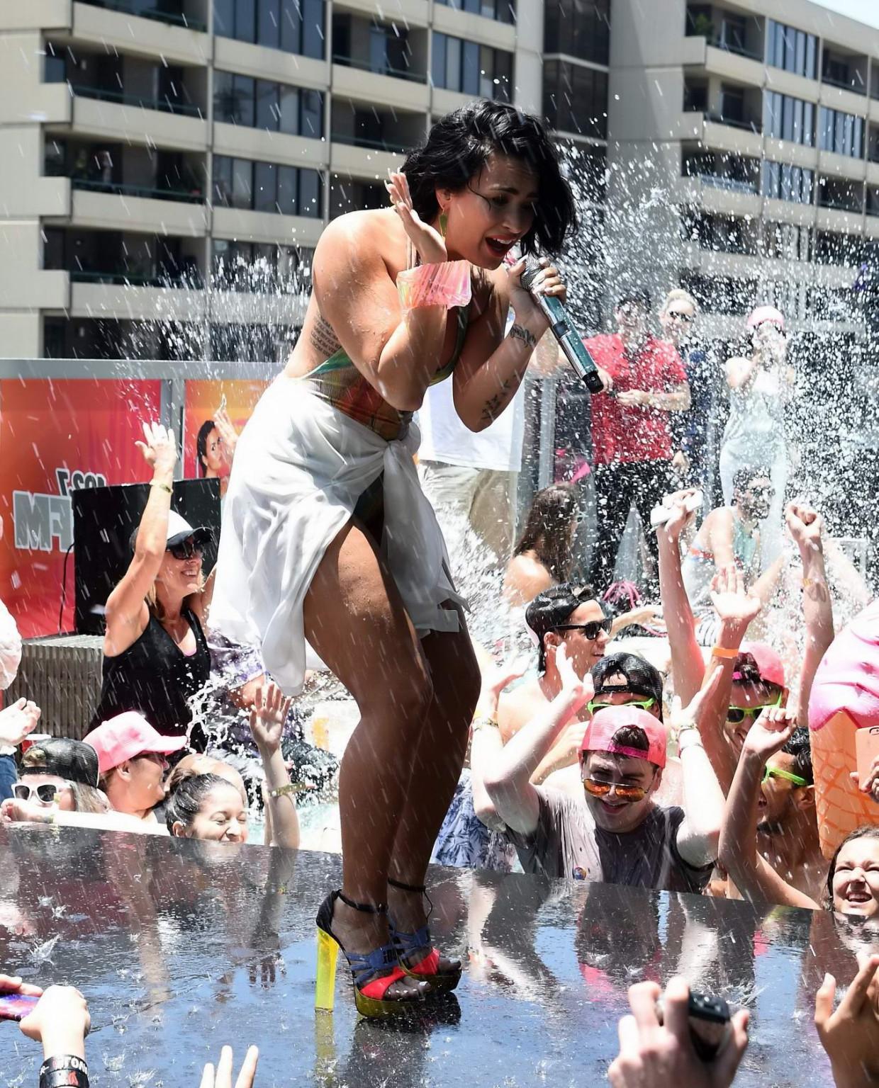 16P Demi Lovato getting wet in low cut swimsuit poolside