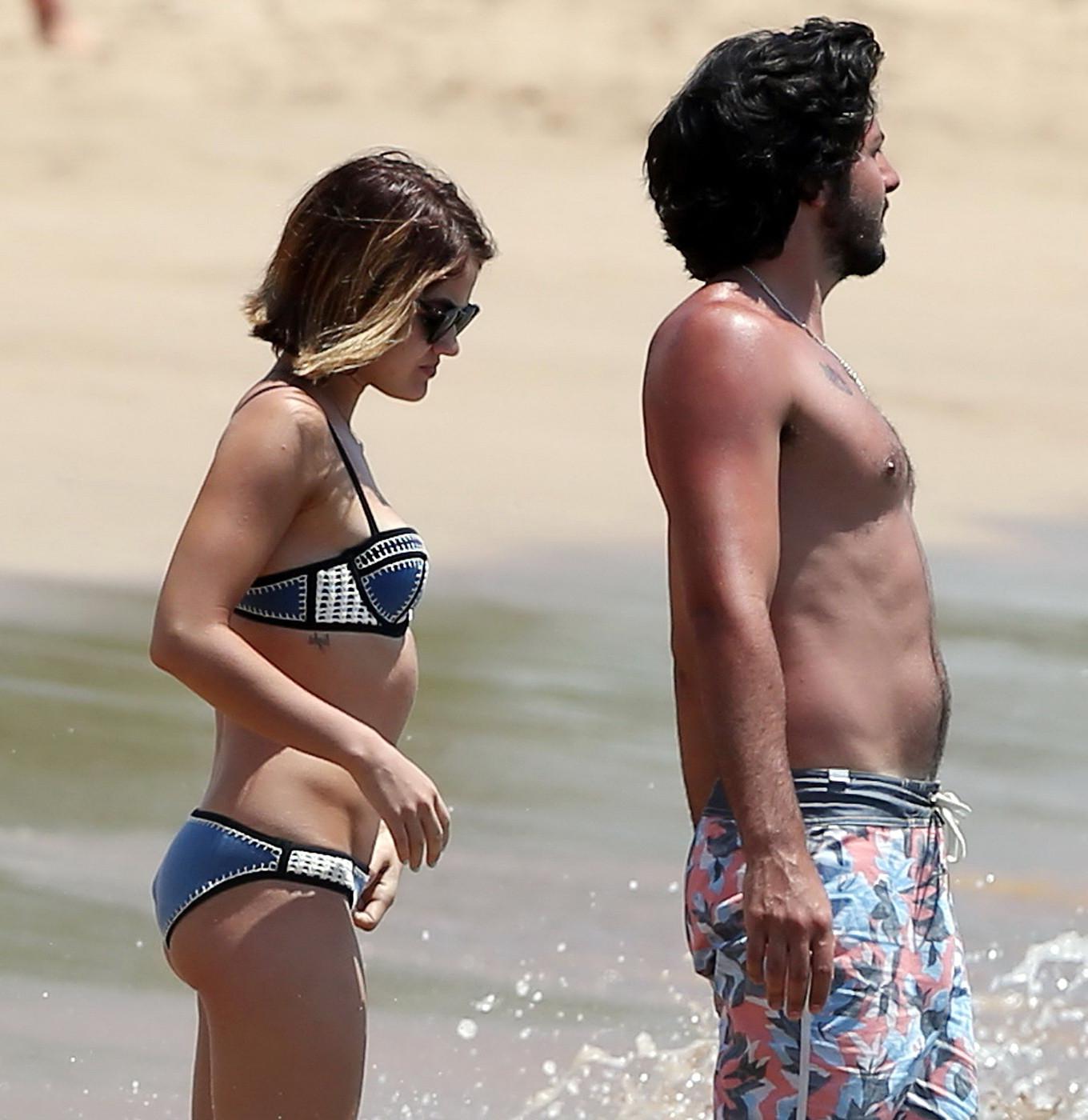 16P Lucy Hale showing off her bikini body on a Hawaiian beach