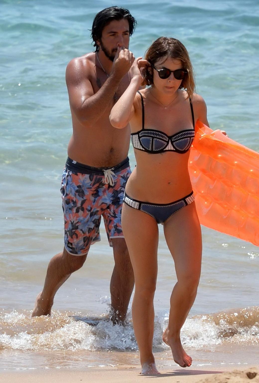 16P Lucy Hale showing off her bikini body on a Hawaiian beach
