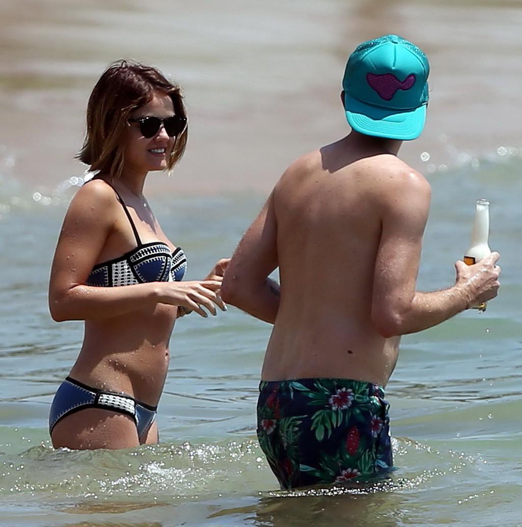 16P Lucy Hale showing off her bikini body on a Hawaiian beach