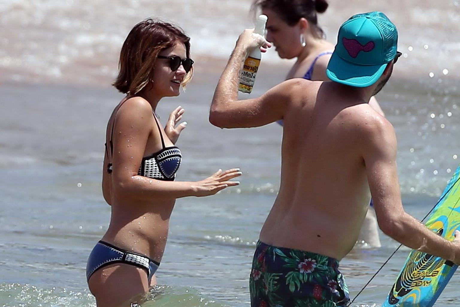 16P Lucy Hale showing off her bikini body on a Hawaiian beach