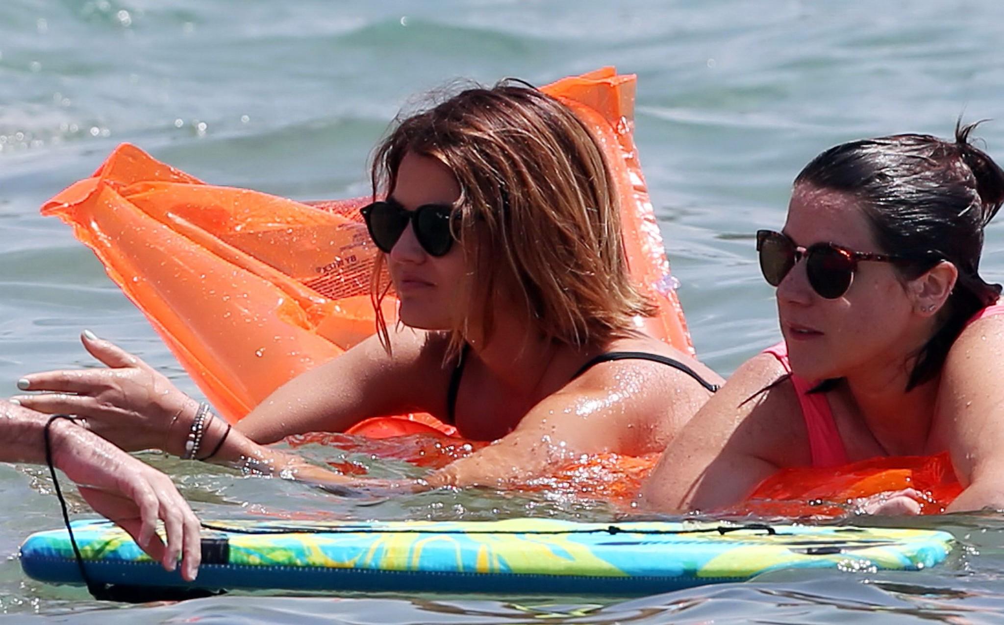 16P Lucy Hale showing off her bikini body on a Hawaiian beach