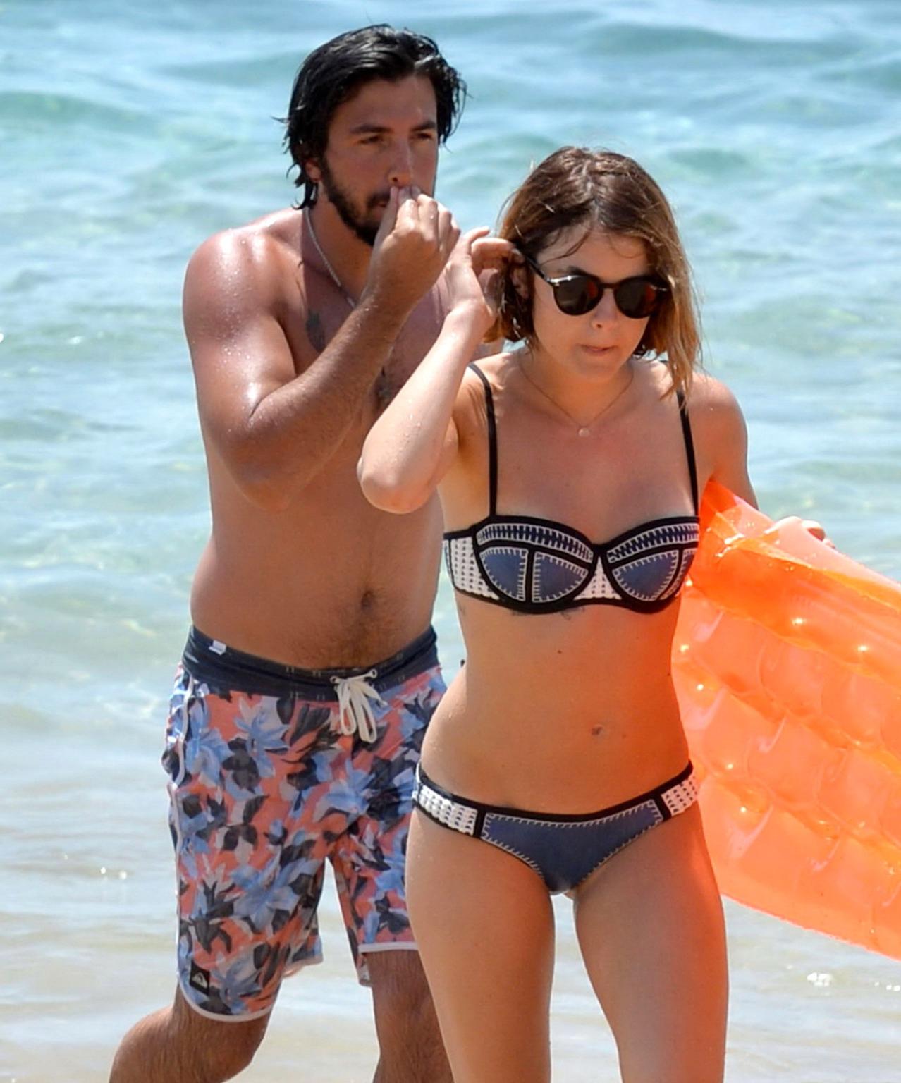 16P Lucy Hale showing off her bikini body on a Hawaiian beach
