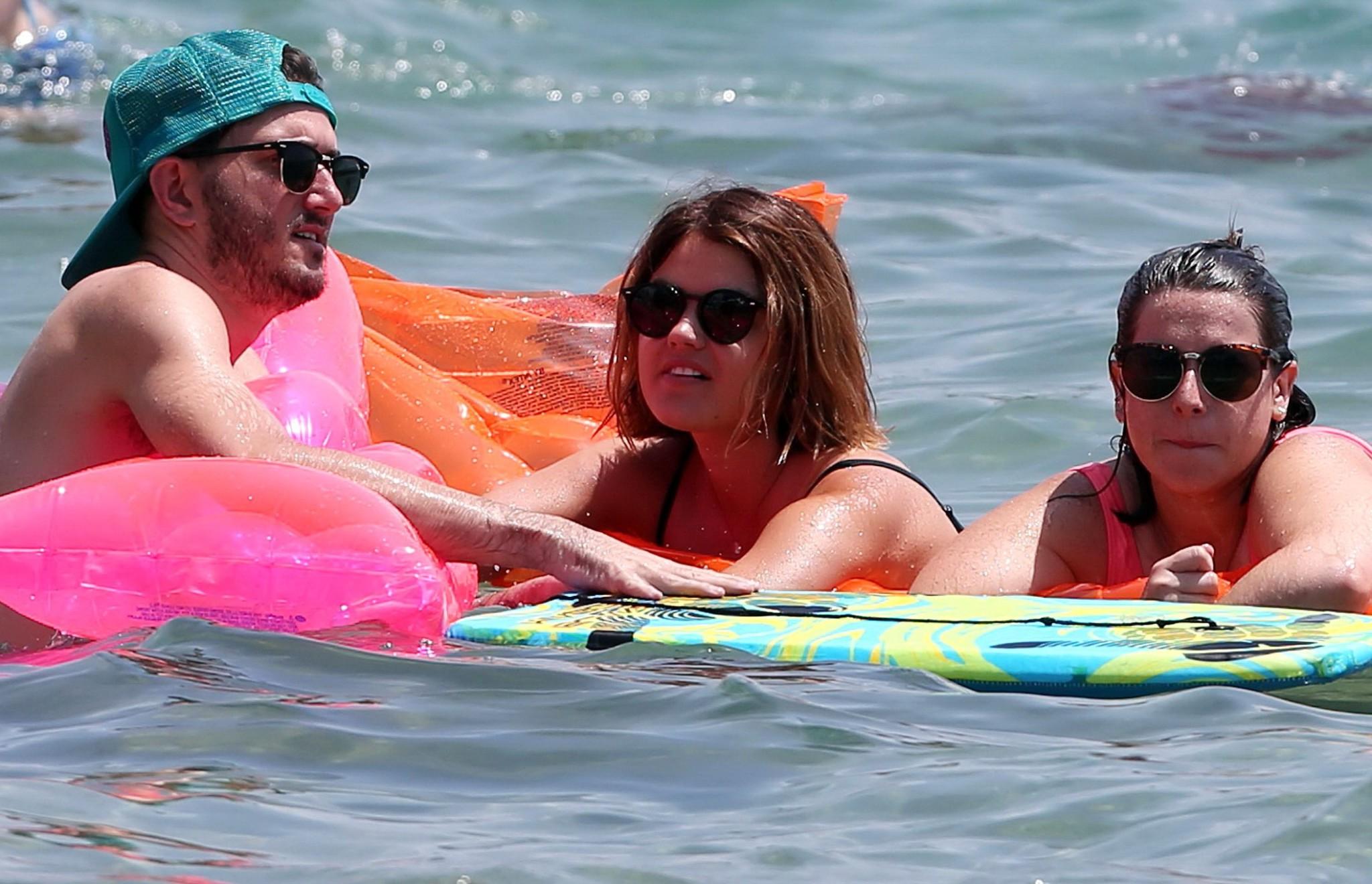 16P Lucy Hale showing off her bikini body on a Hawaiian beach