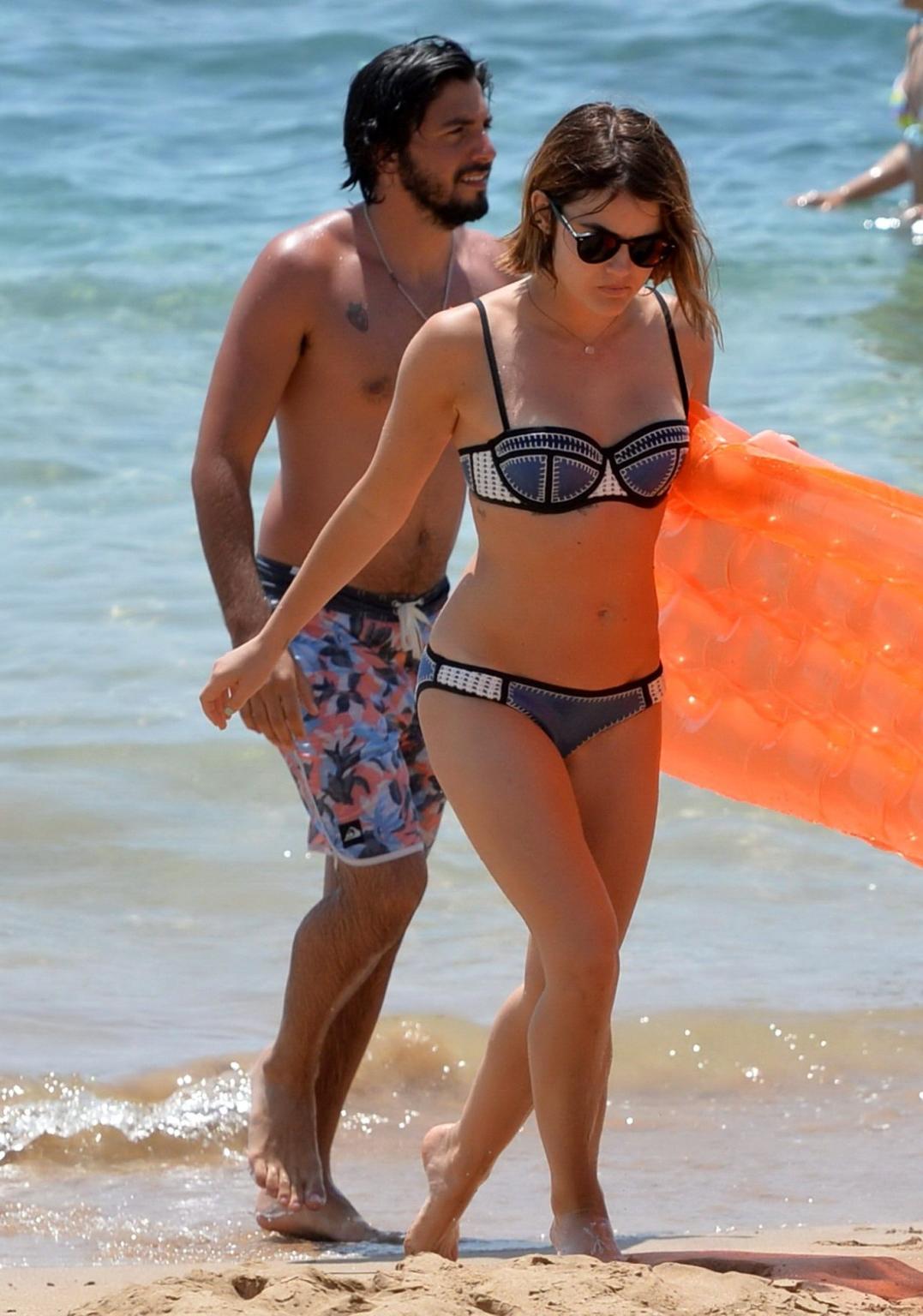 16P Lucy Hale showing off her bikini body on a Hawaiian beach