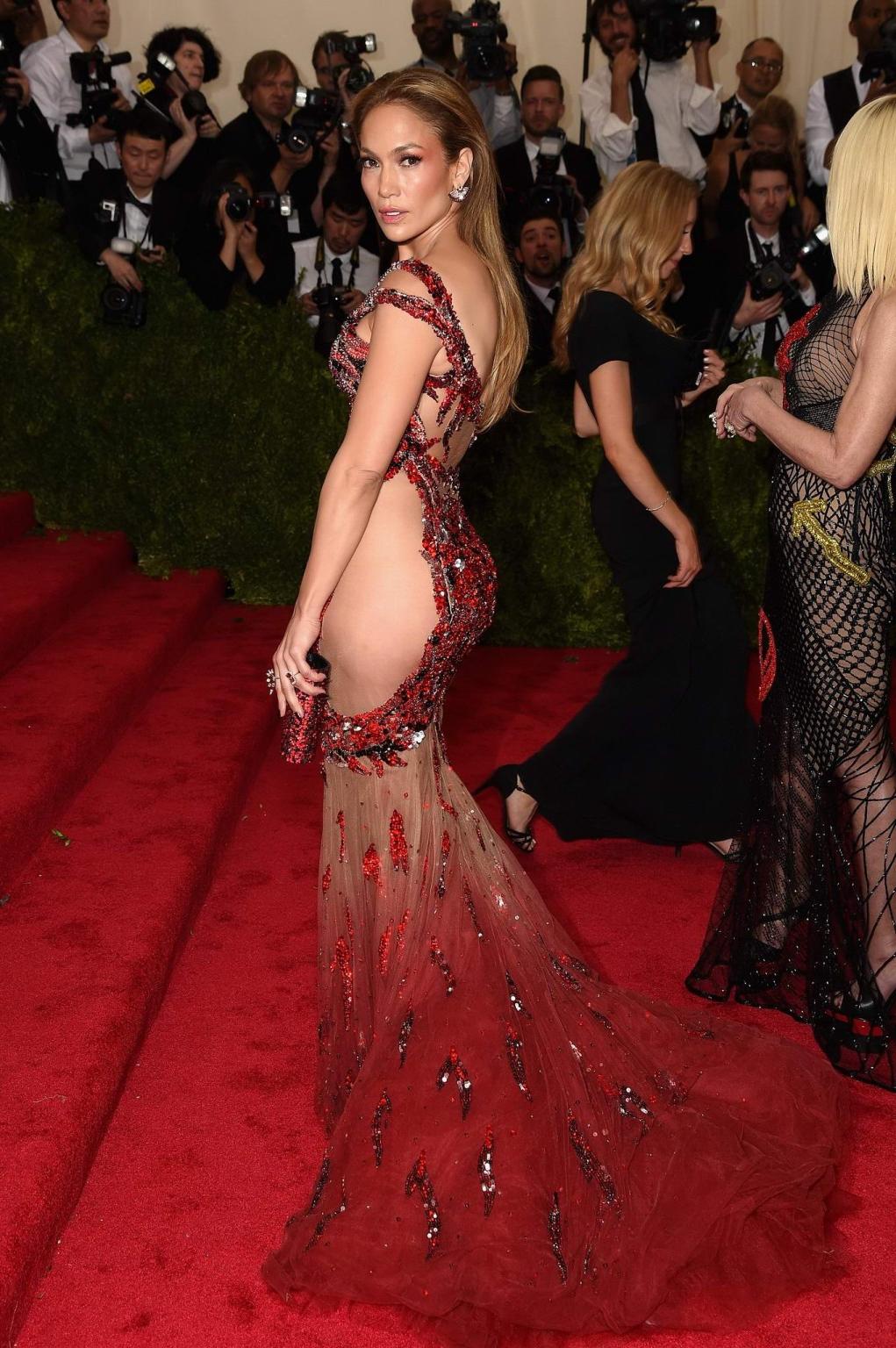 16P Jennifer Lopez pantyless wearing a side see through dress for the Costume Instit
