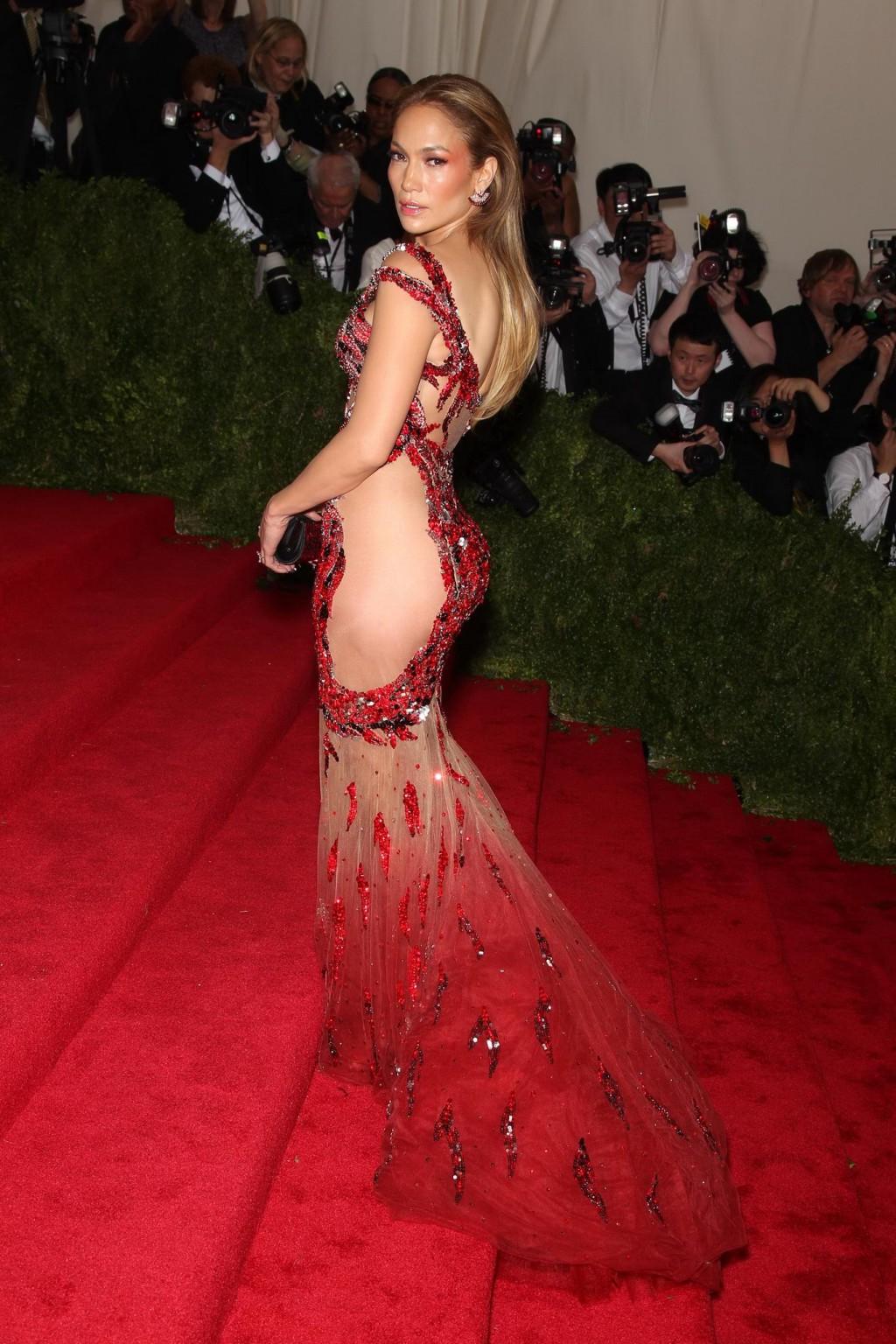 16P Jennifer Lopez pantyless wearing a side see through dress for the Costume Instit