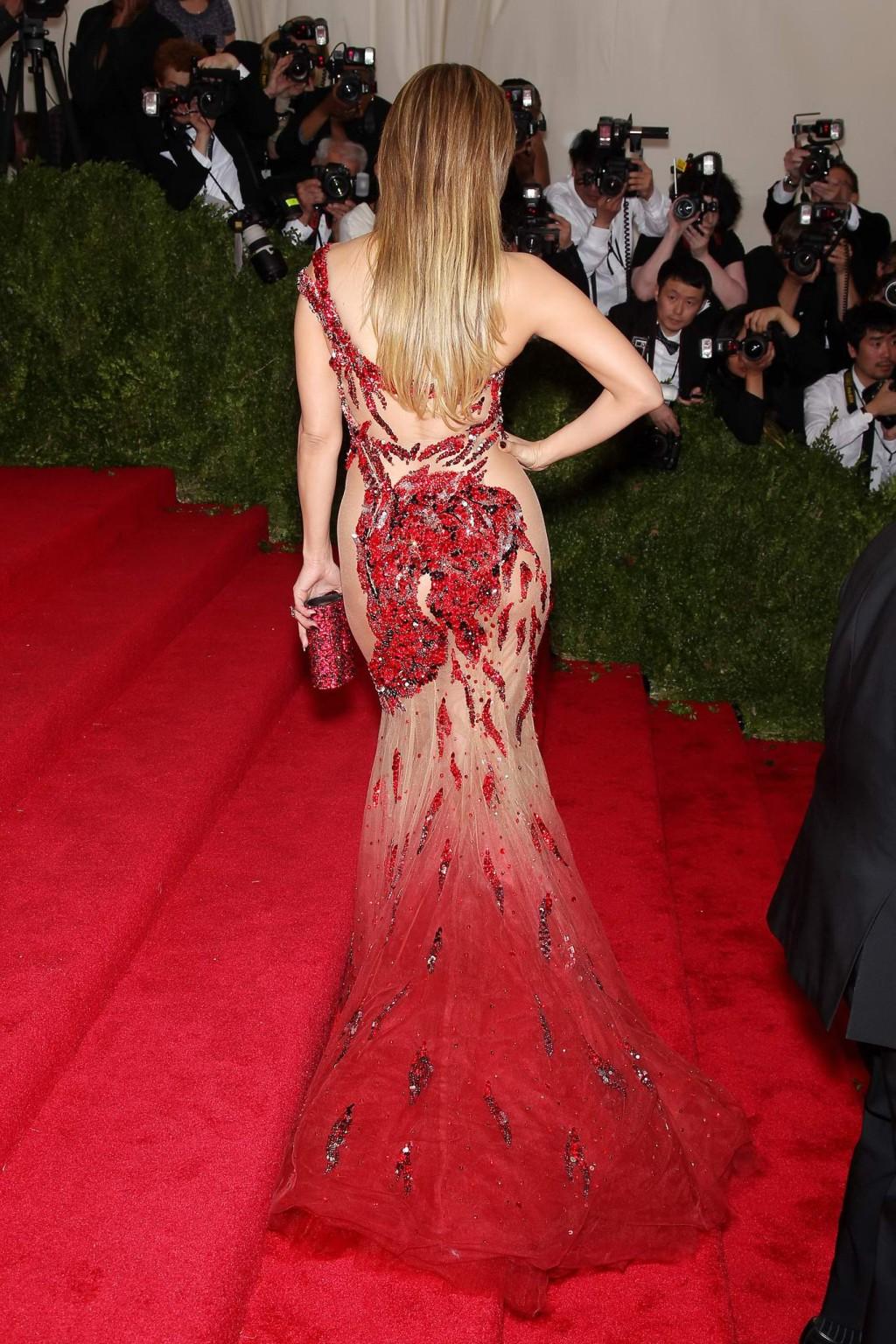 16P Jennifer Lopez pantyless wearing a side see through dress for the Costume Instit