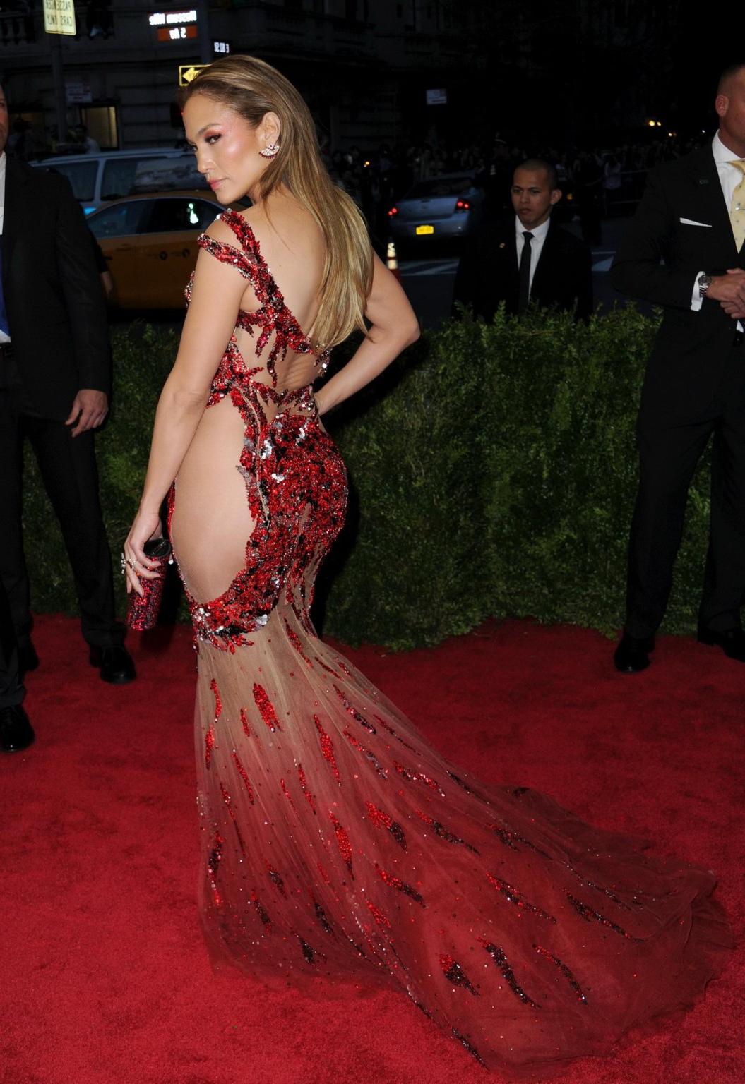 16P Jennifer Lopez pantyless wearing a side see through dress for the Costume Instit