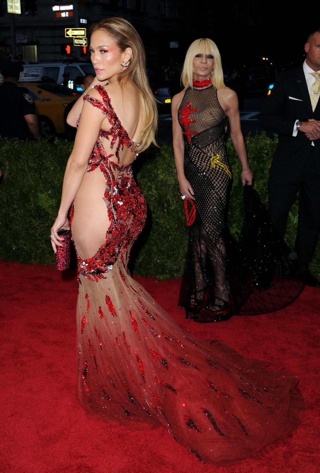 16P Jennifer Lopez pantyless wearing a side see through dress for the Costume Instit