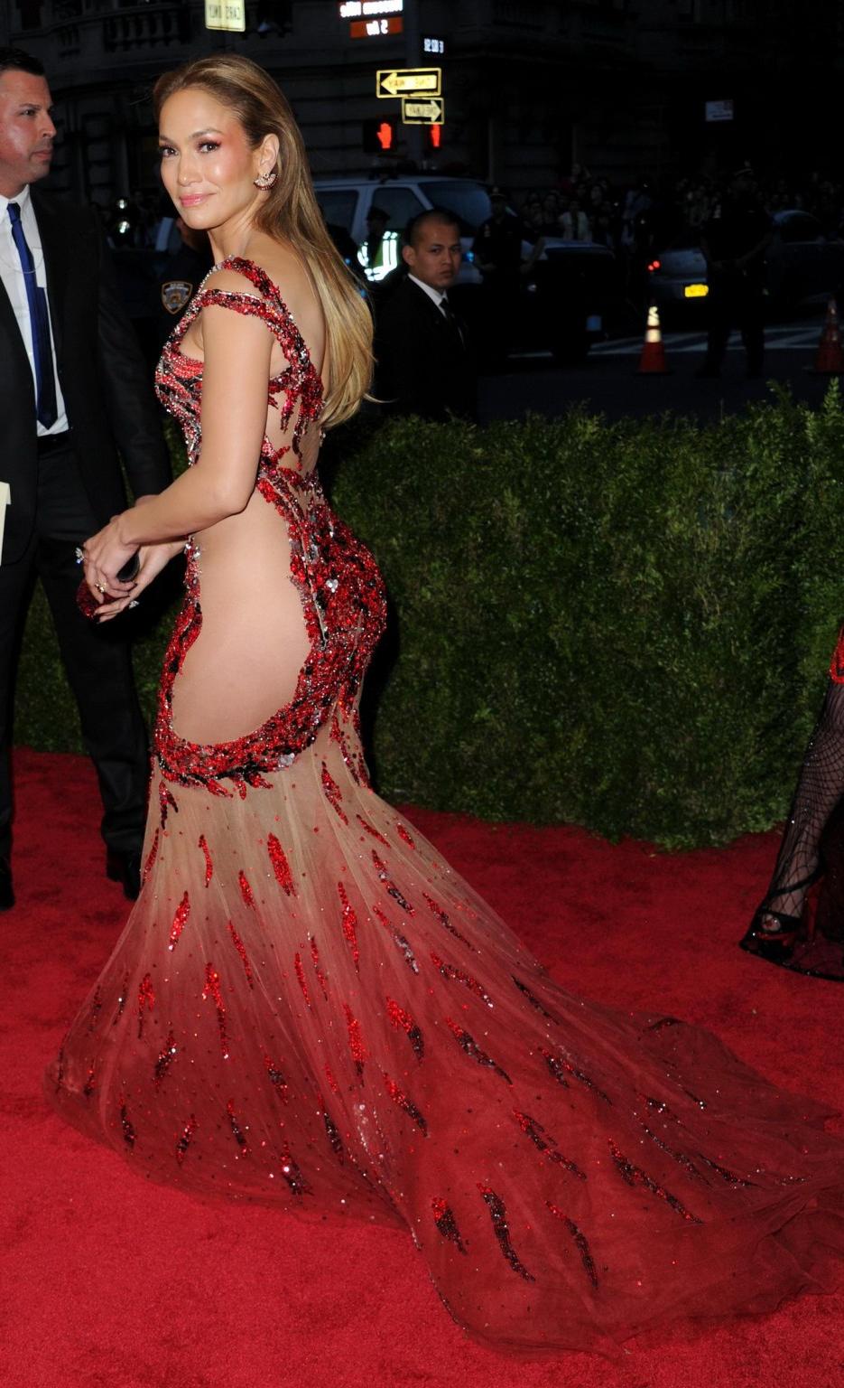 16P Jennifer Lopez pantyless wearing a side see through dress for the Costume Instit