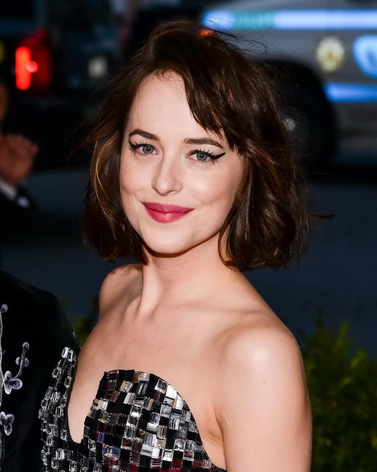 16P Dakota Johnson leggy  cleavy wearing a tube mini dress for the Costume Institute