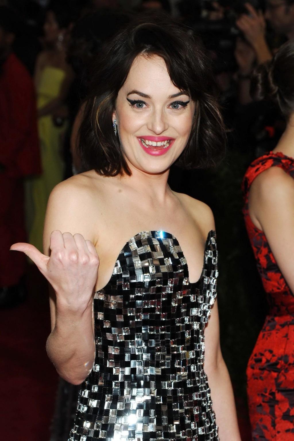 16P Dakota Johnson leggy  cleavy wearing a tube mini dress for the Costume Institute
