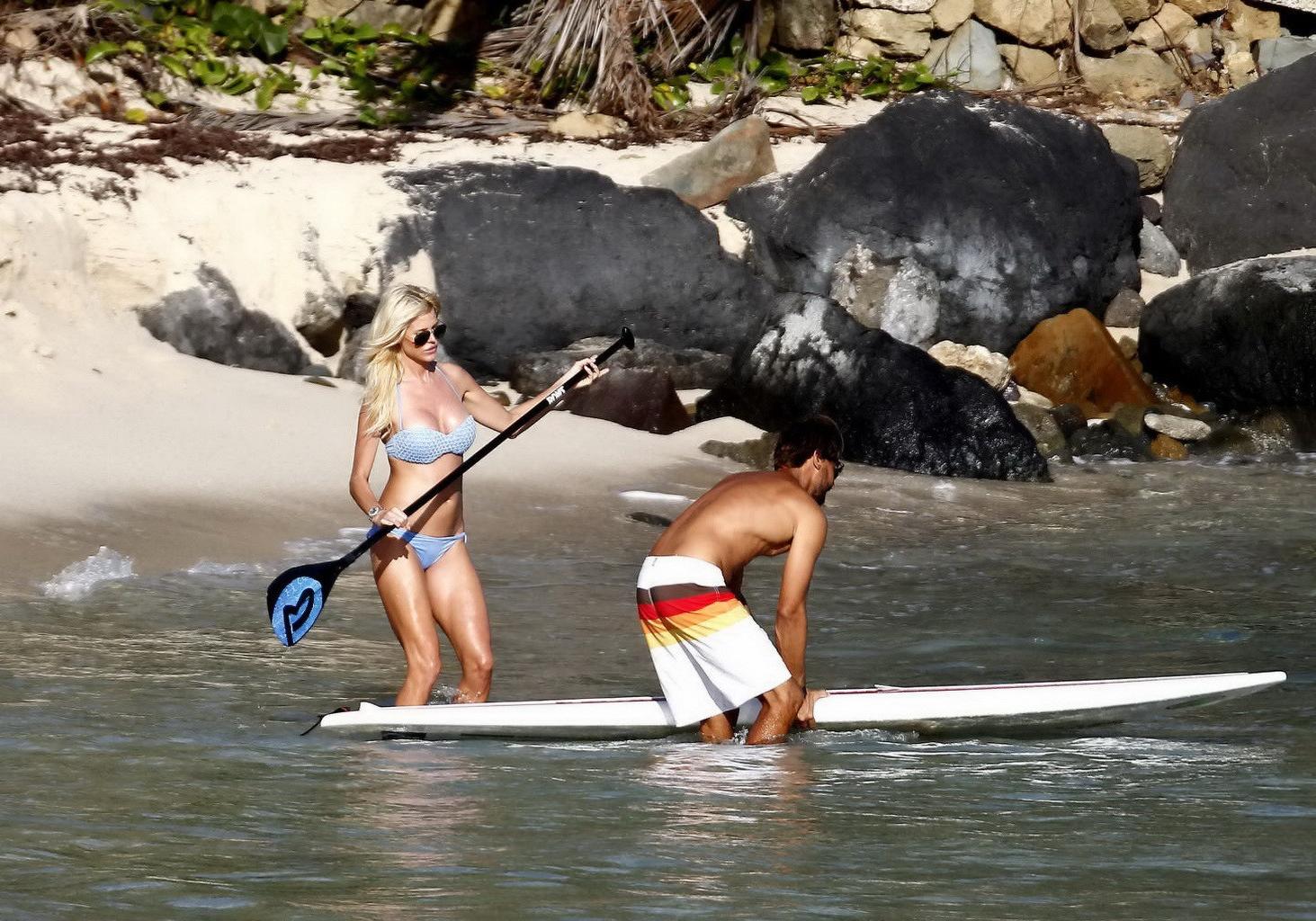16P Victoria Silvstedt shows off her huge boobs and ass in a tiny blue bikini while 