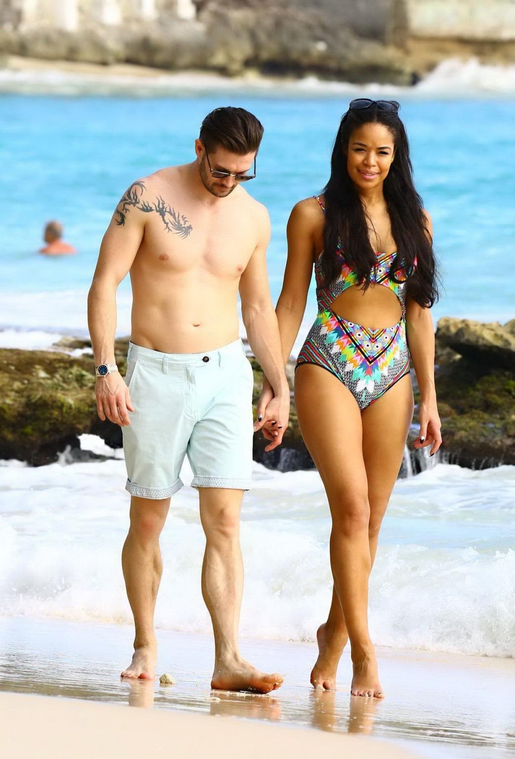 16P Sarah Jane Crawford shows off her seductive curves in a colorful swimsuit at the