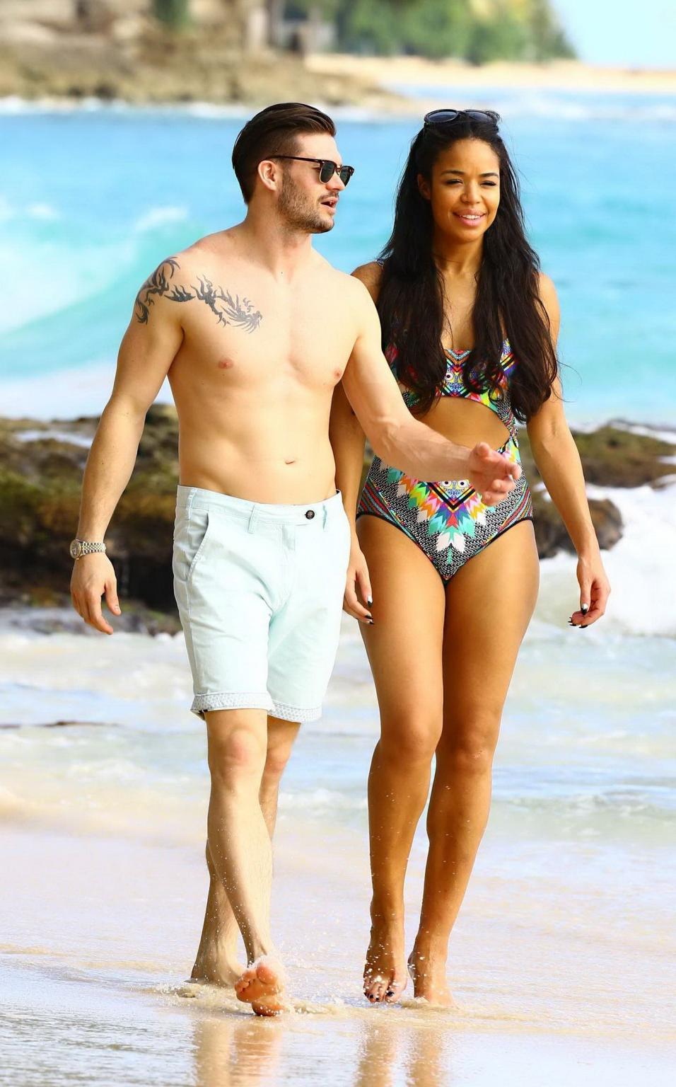 16P Sarah Jane Crawford shows off her seductive curves in a colorful swimsuit at the
