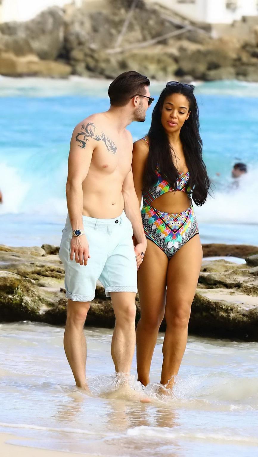 16P Sarah Jane Crawford shows off her seductive curves in a colorful swimsuit at the
