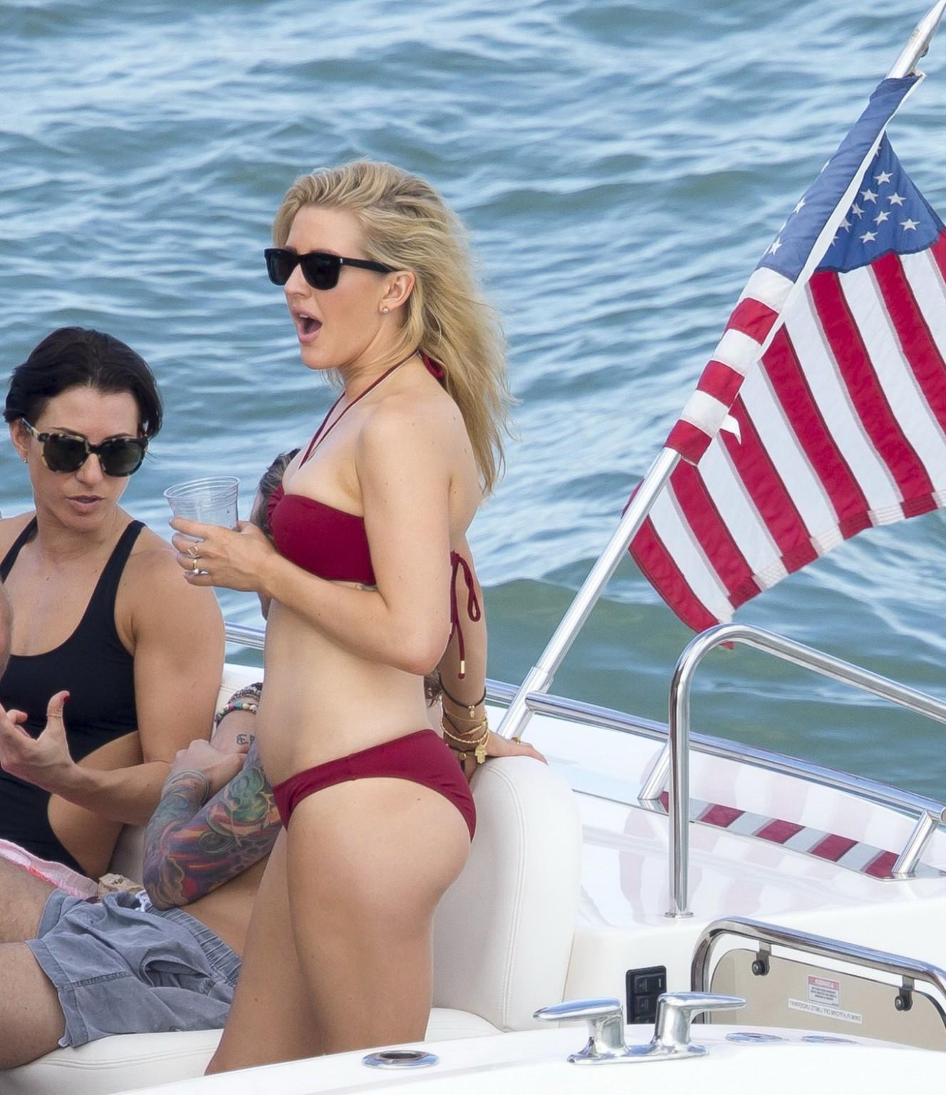 16P Ellie Goulding showing her ass in skimpy cherry colored bikini at the boat in Mi