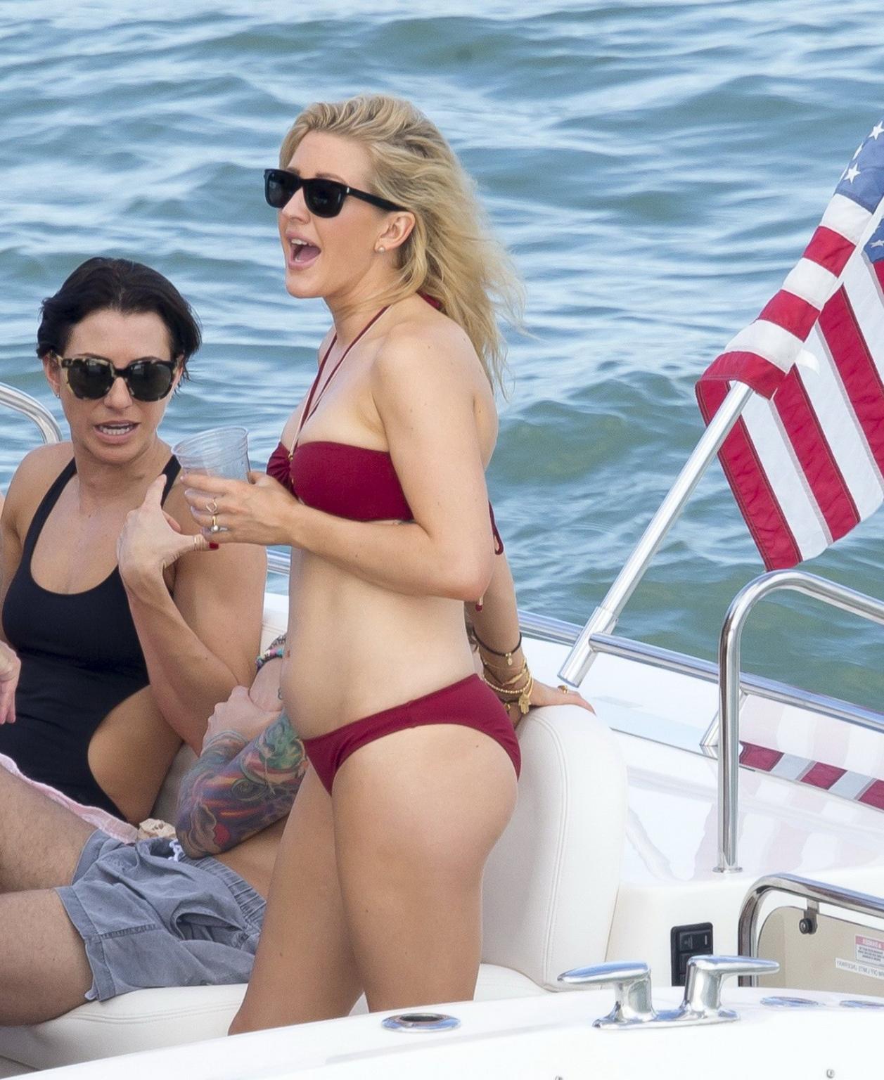 16P Ellie Goulding showing her ass in skimpy cherry colored bikini at the boat in Mi