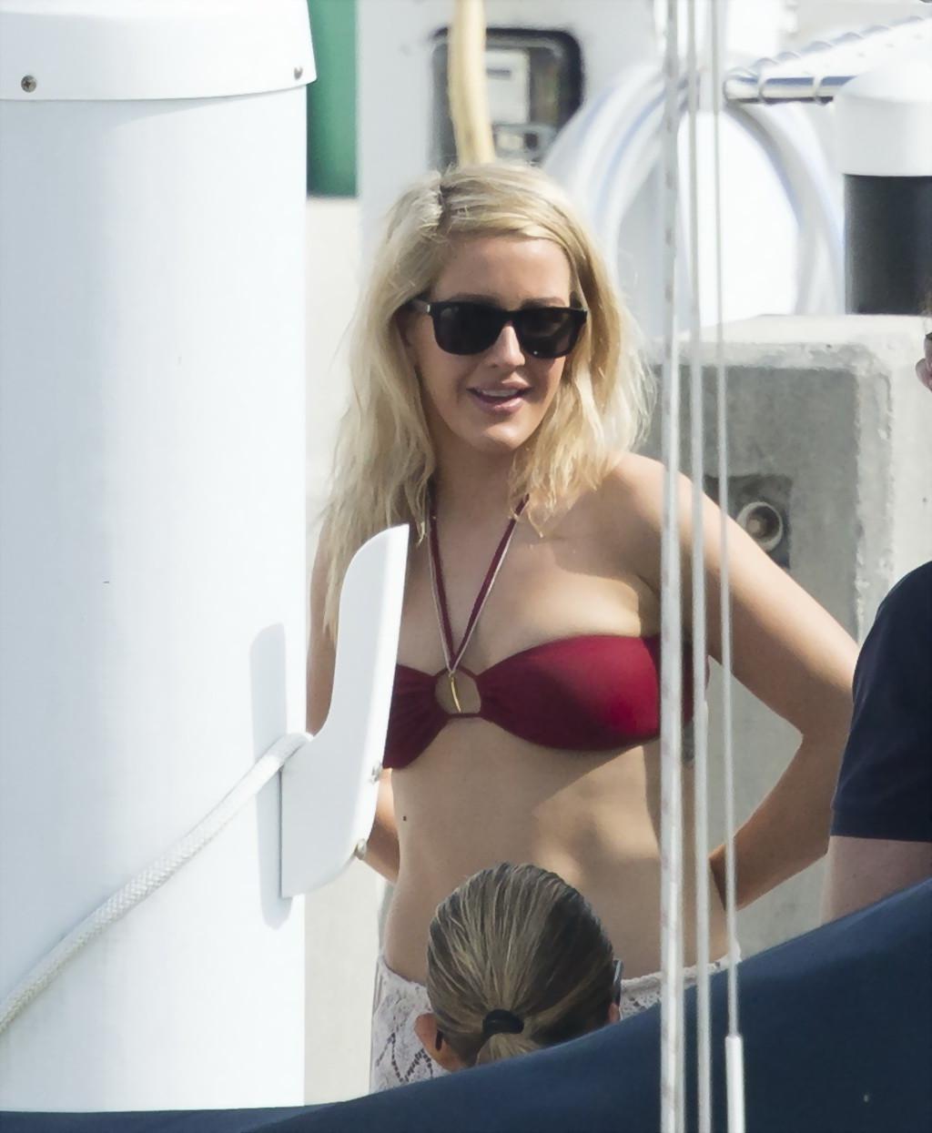 16P Ellie Goulding showing her ass in skimpy cherry colored bikini at the boat in Mi