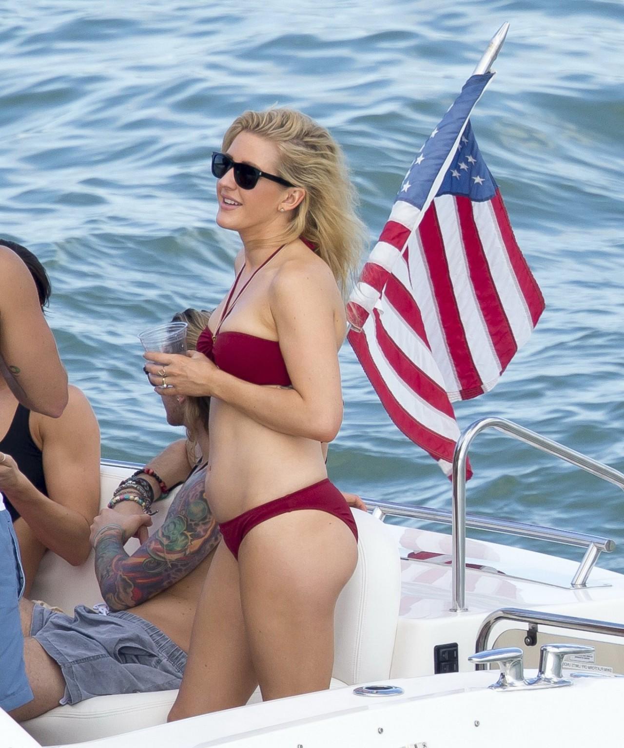 16P Ellie Goulding showing her ass in skimpy cherry colored bikini at the boat in Mi