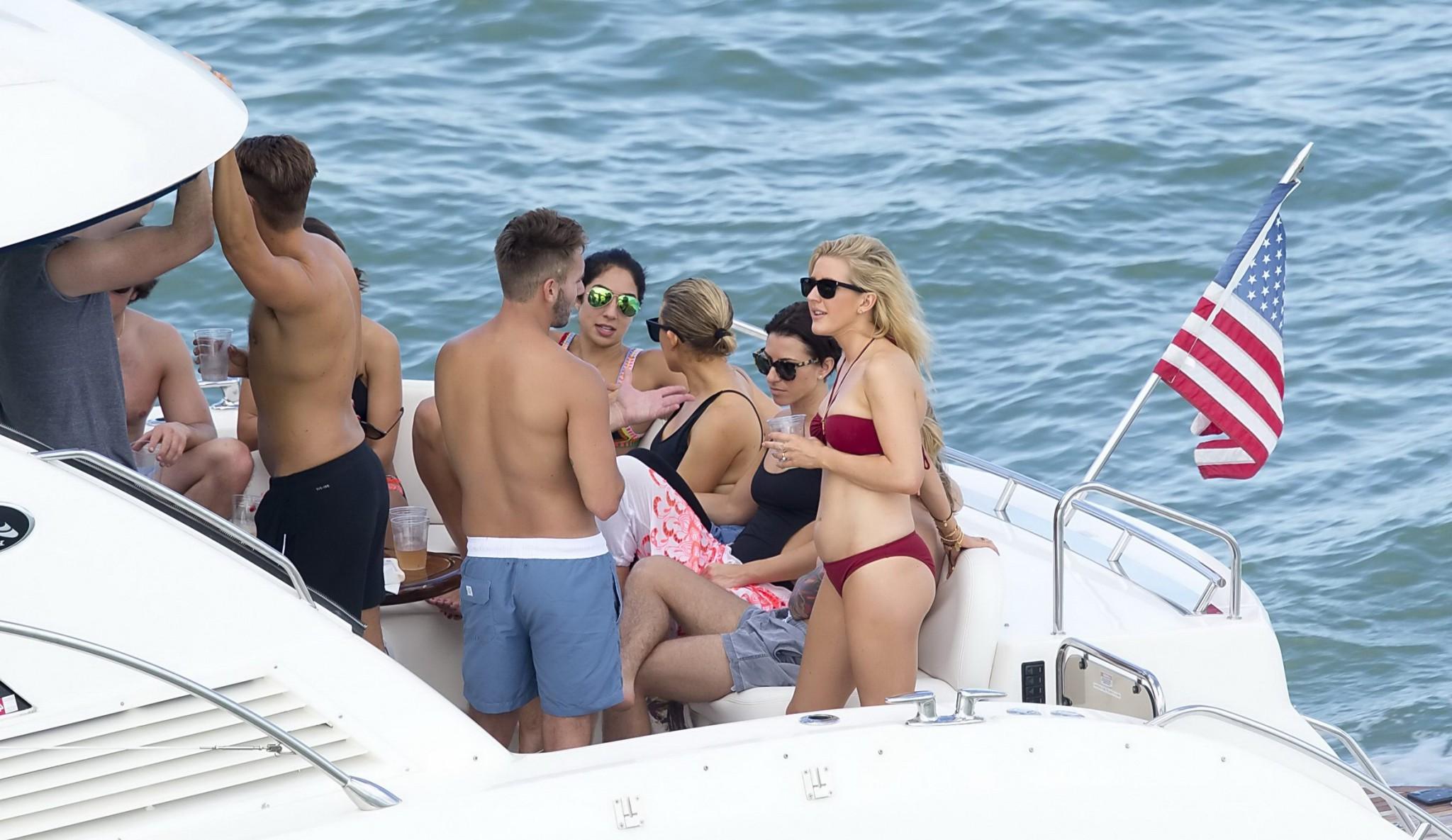 16P Ellie Goulding showing her ass in skimpy cherry colored bikini at the boat in Mi