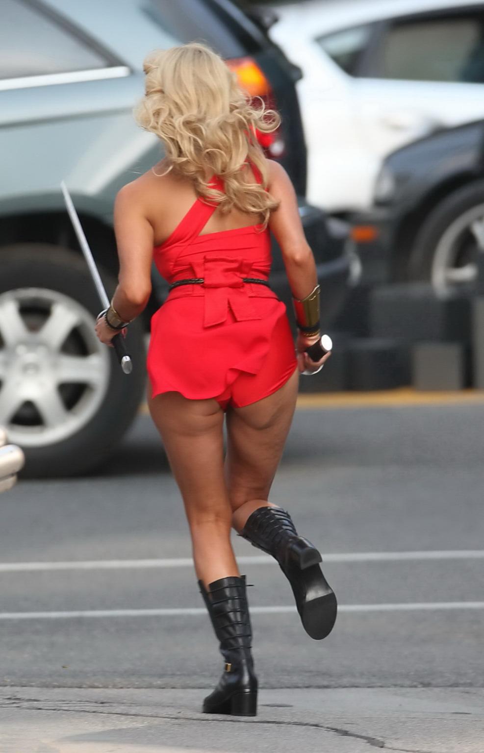 16P Ashley Benson showing ass and sweaty crotch in tiny red costume at the Pixels se
