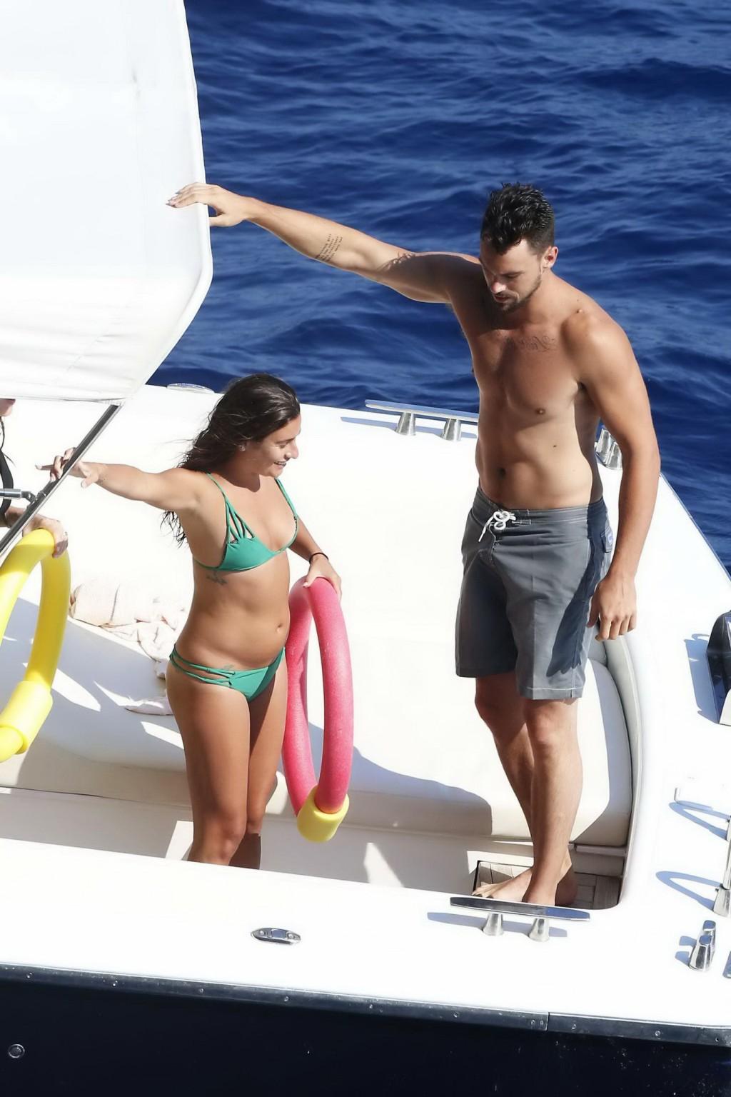 16P Lea Michele nipple slip from her tiny green bikini on the boat during a vacation