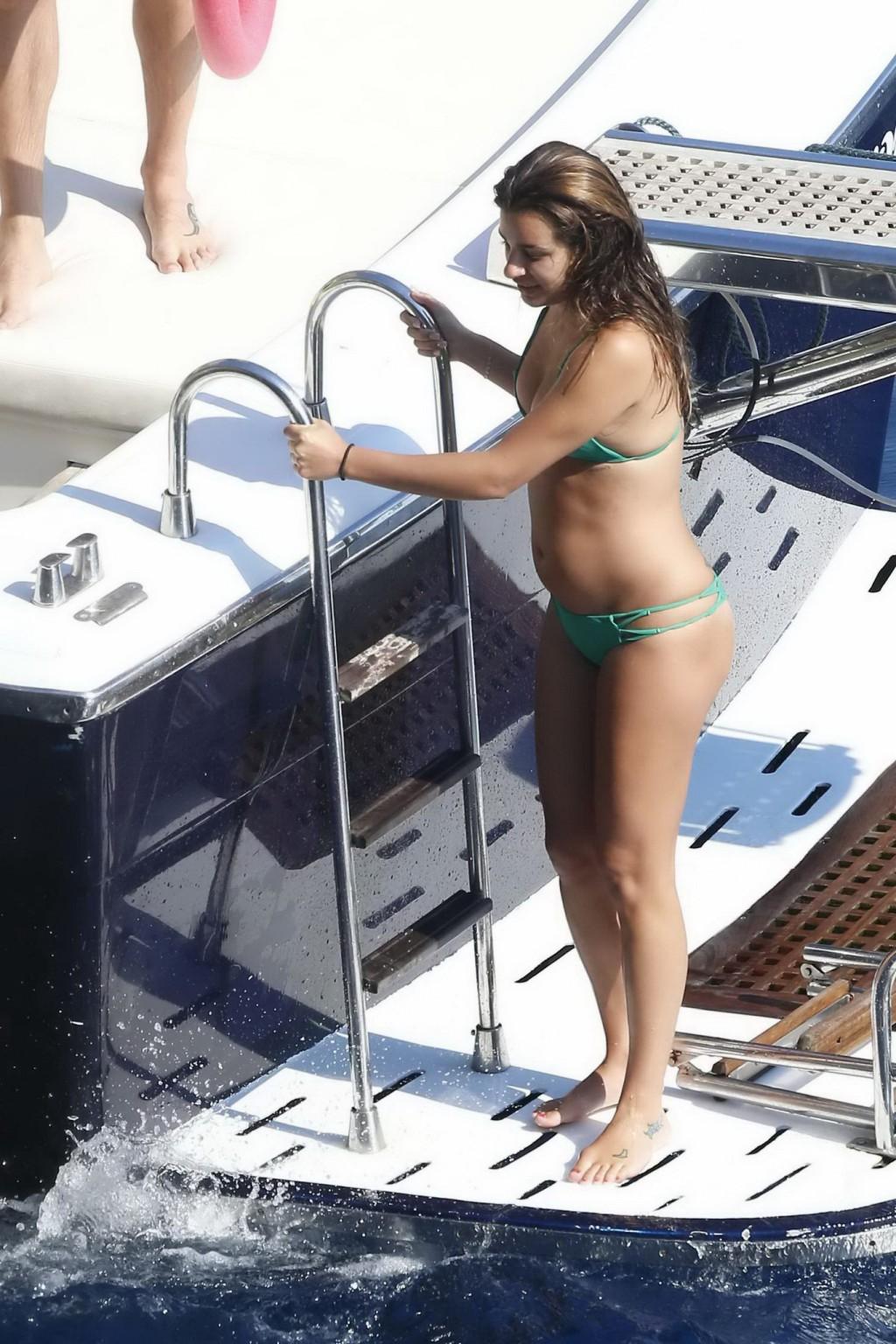 16P Lea Michele nipple slip from her tiny green bikini on the boat during a vacation