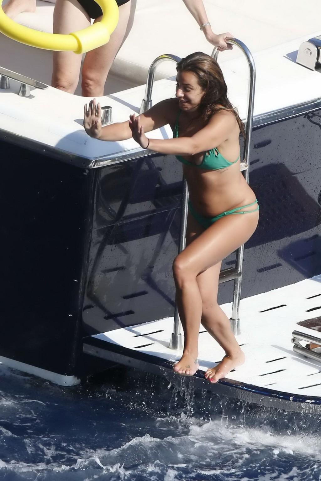 16P Lea Michele nipple slip from her tiny green bikini on the boat during a vacation