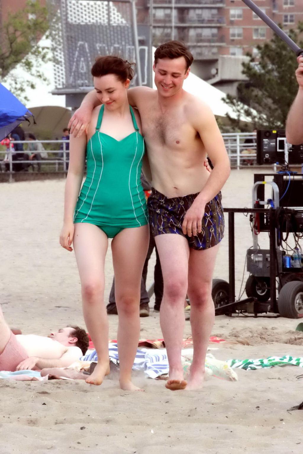 16P Saoirse Ronan booty wearing retro green swimsuit at the beach in New York
