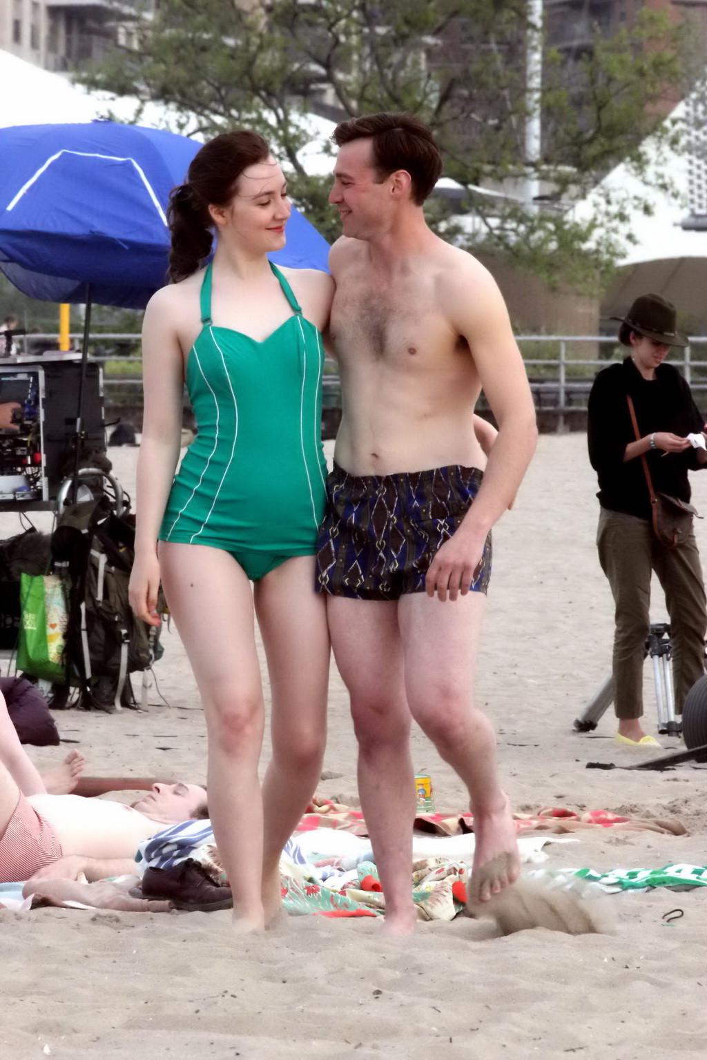 16P Saoirse Ronan booty wearing retro green swimsuit at the beach in New York