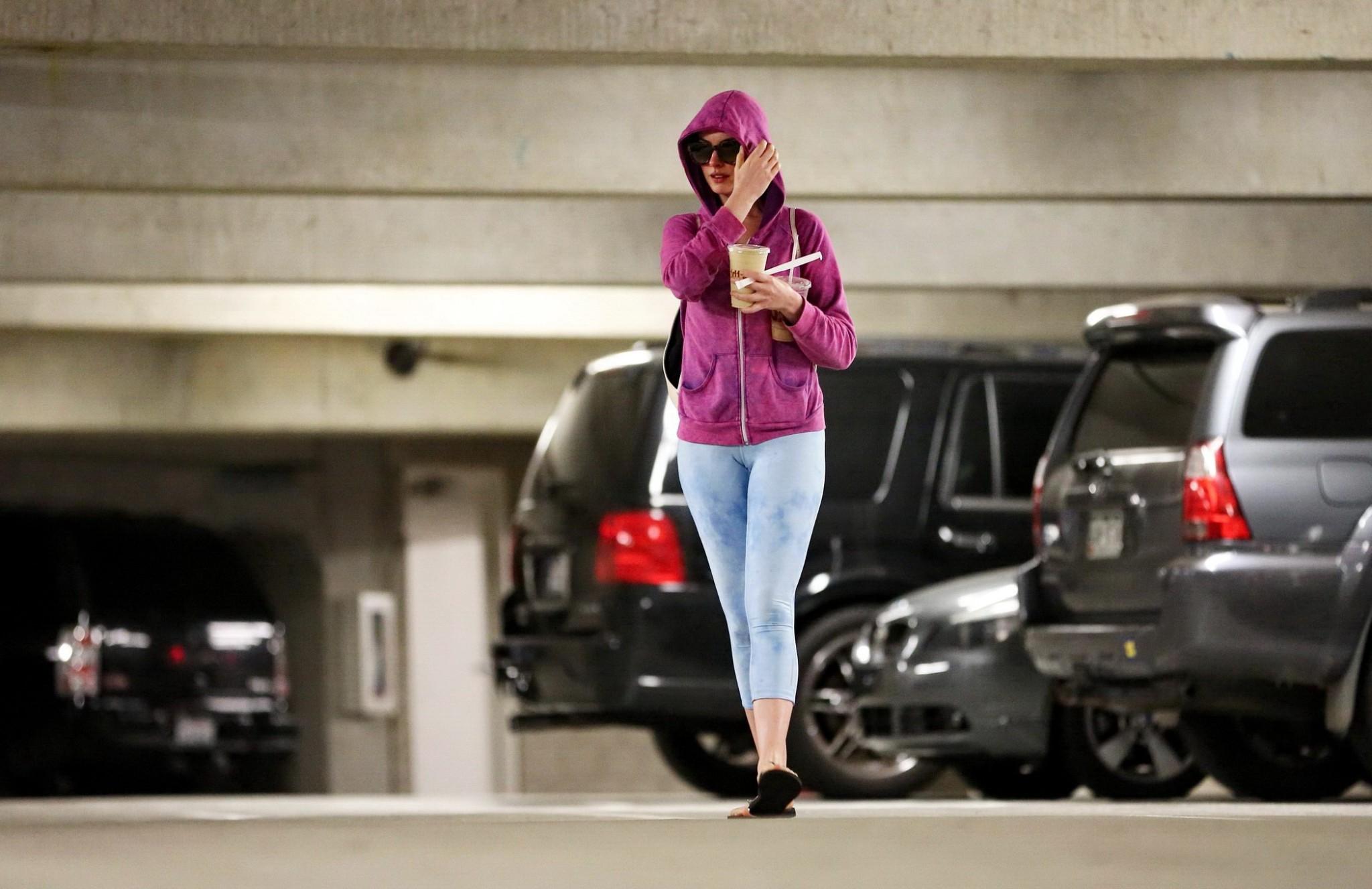 16P Anne Hathaway showing off her ass and cameltoe in sky blue tights